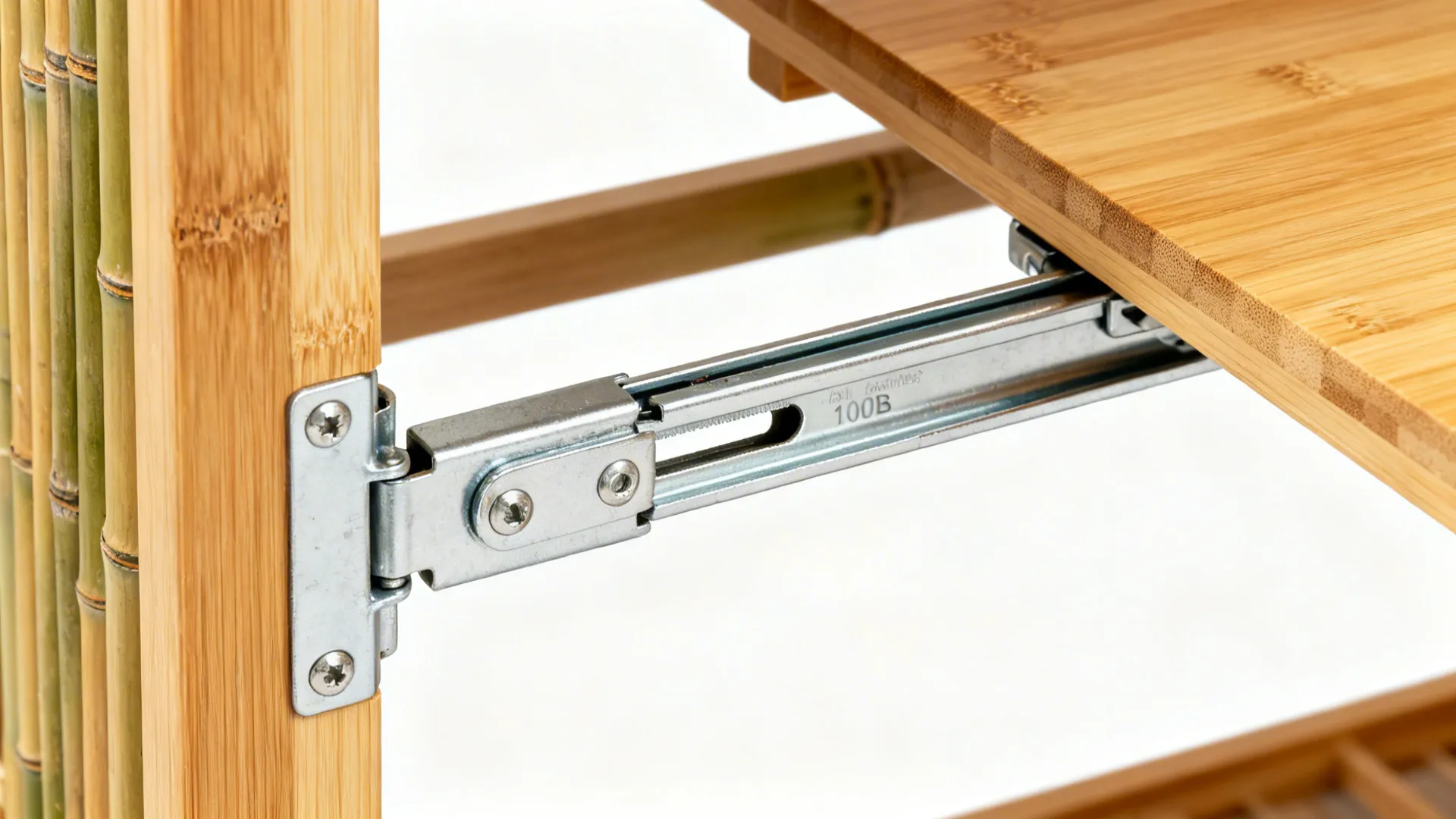 Macro detail of full-extension slide hardware supporting a bamboo pull-out shelf.