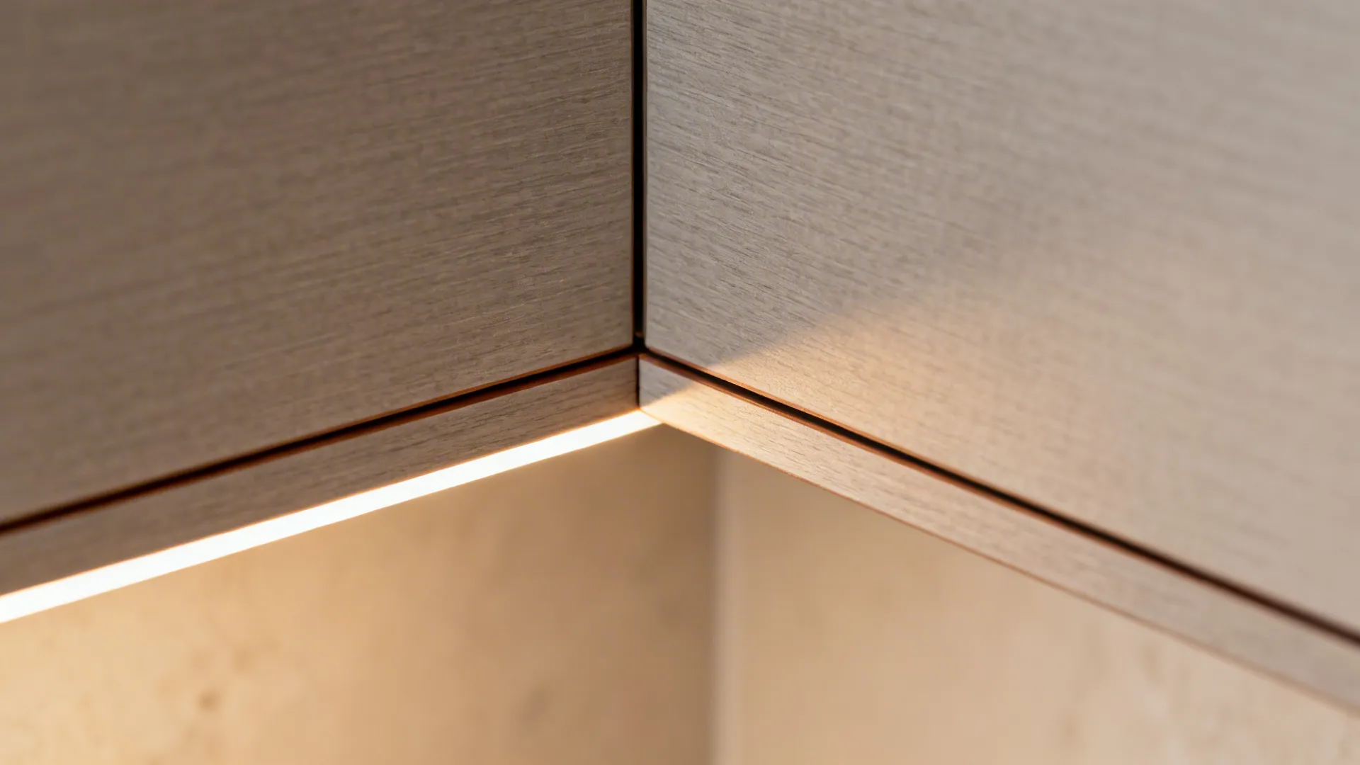 Macro of matte cabinet corner with clean edge-banding and subtle LED light.