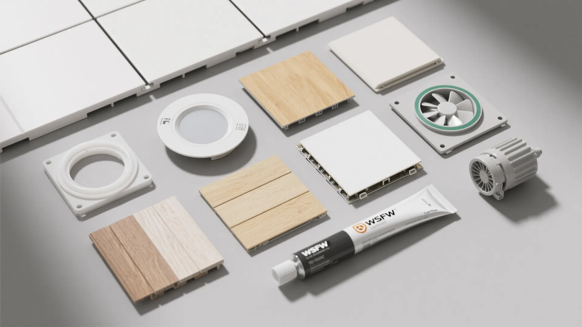 Collection of interior design materials including wood panels light fixtures floor tiles and adhesive tube