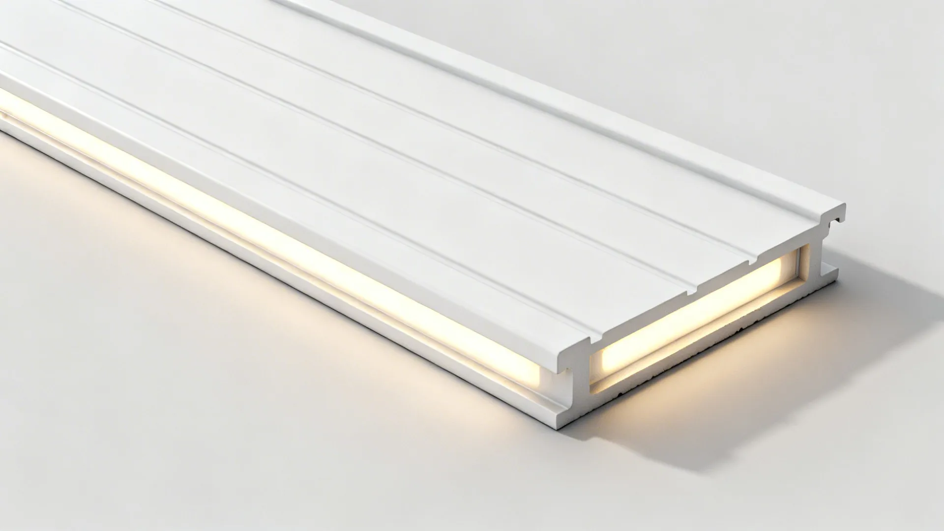 Macro of PVC ceiling plank showing 10–15 mm grooves and a recessed warm LED strip.