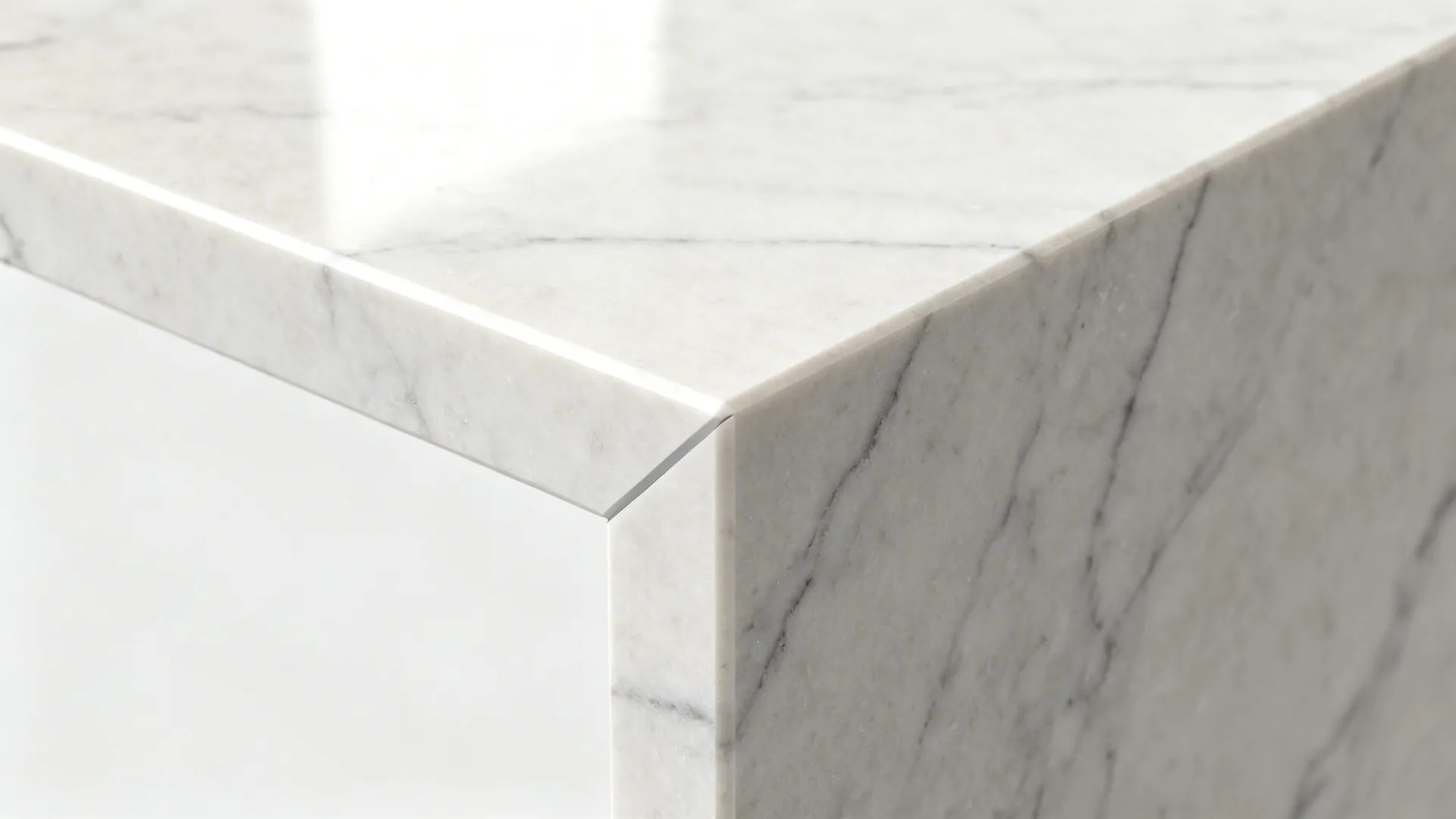 Macro of slim quartz edge with tiny chamfer and satin finish.