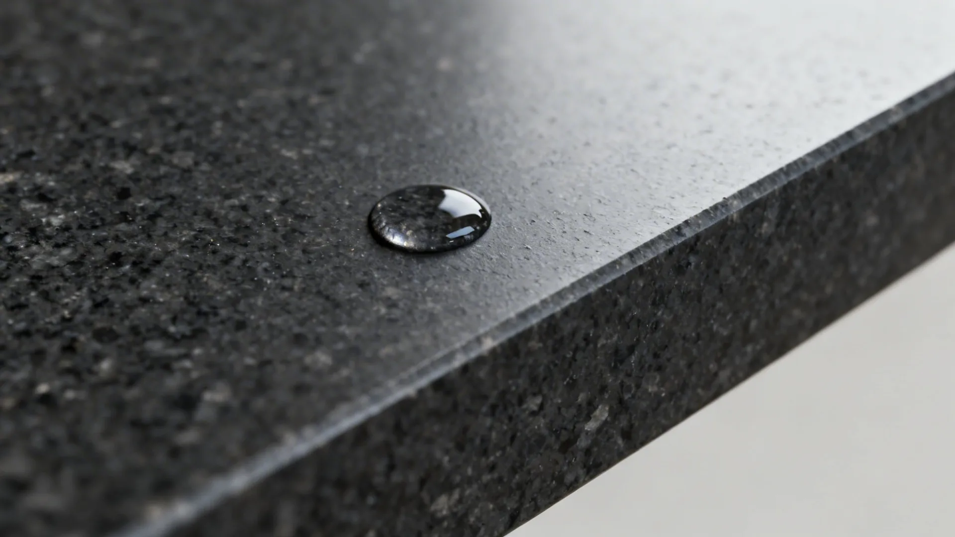Charcoal Stone and Dark Quartz Worktops