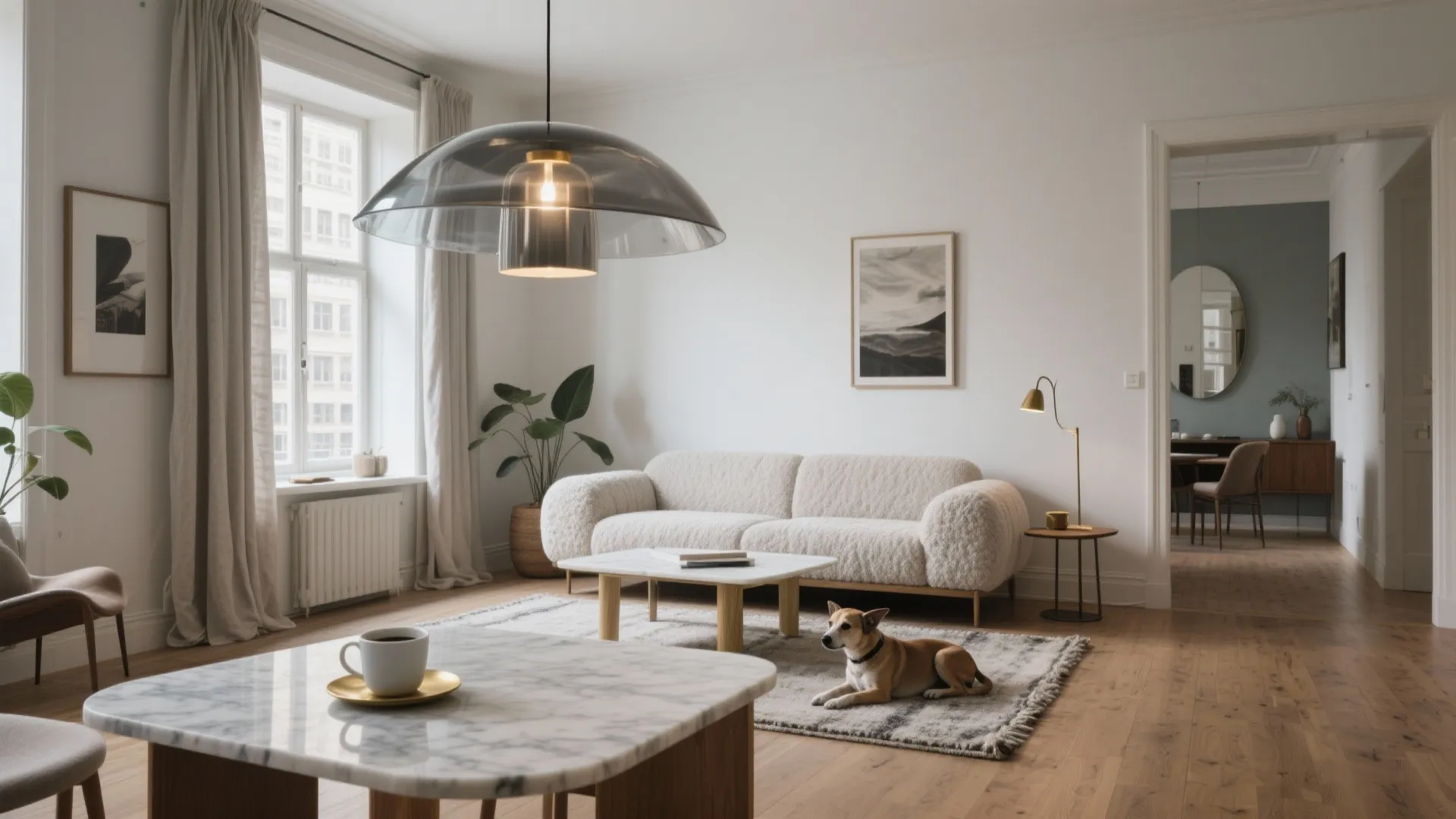 Bright living room with white sofa marble coffee table glass ceiling light and wooden floor