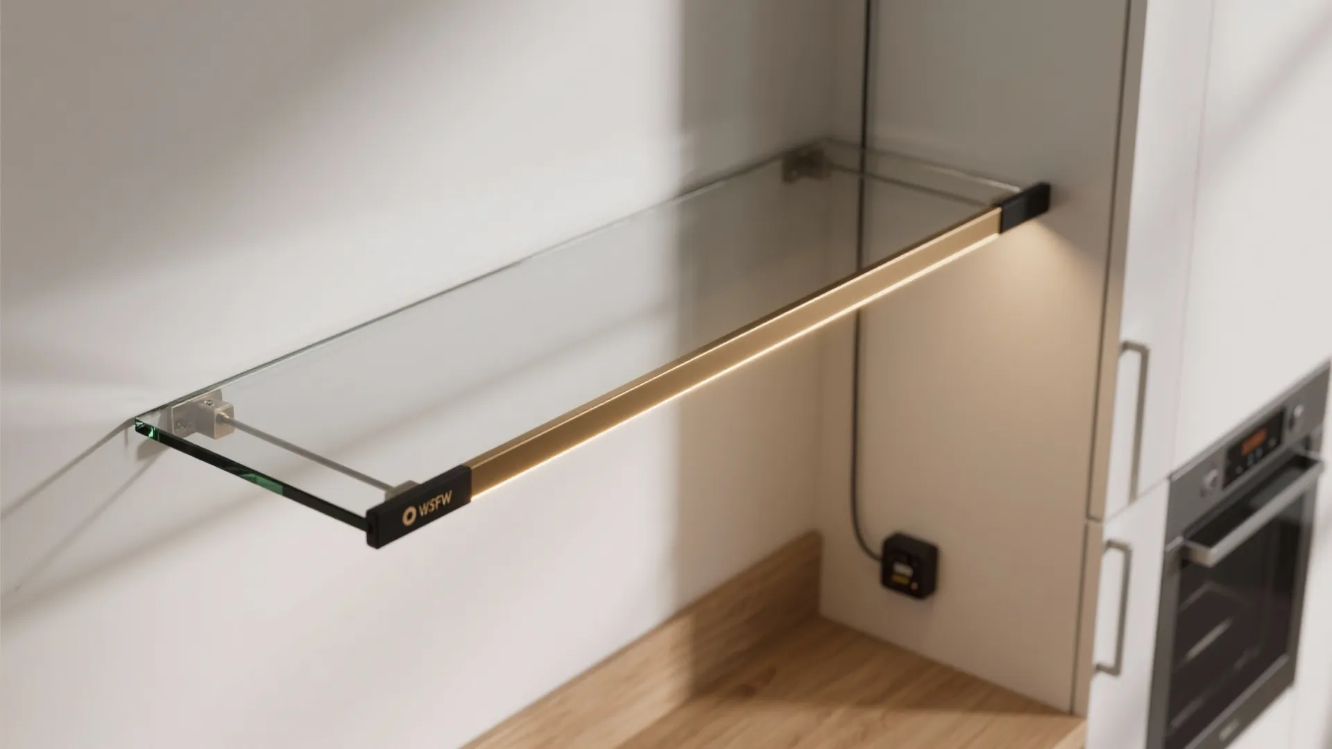 Modern glass wall shelf with built-in gold light fixture mounted on a clean white wall