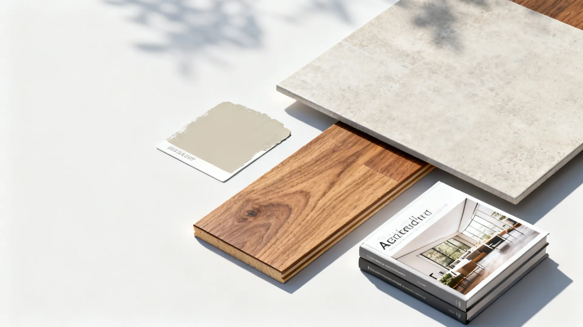 Material swatches and reference books representing ranch design choices and resources