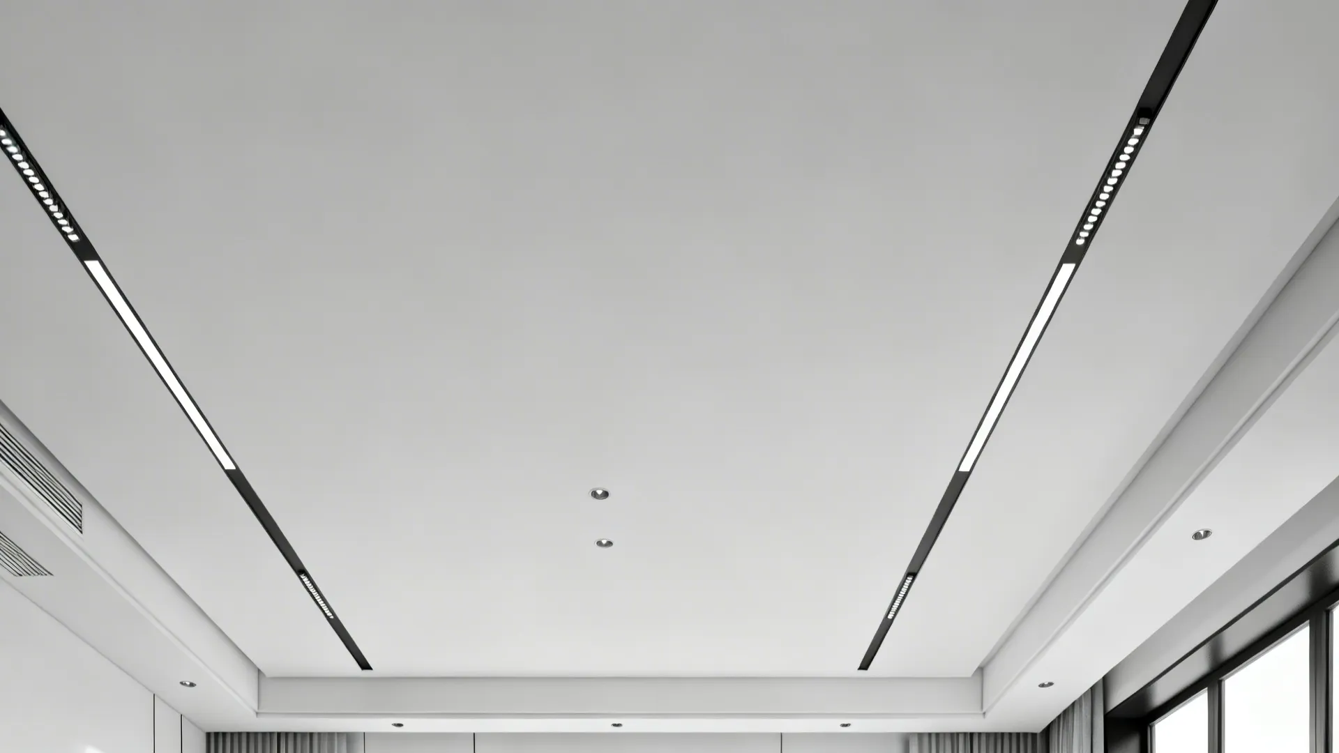 Top-down plan view of recessed linear light runs aligned with circulation.