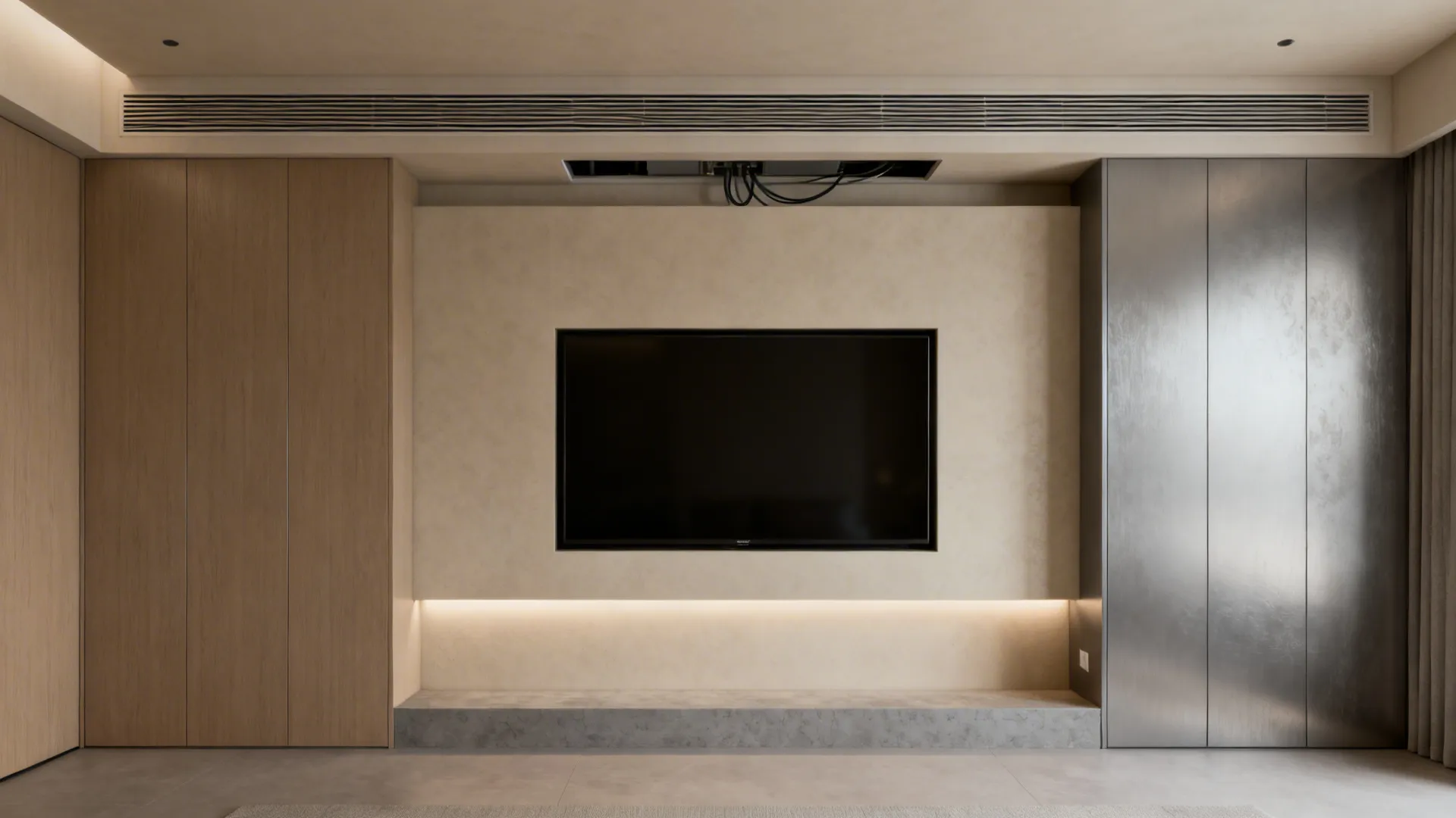 Shallow recessed niche with a flush-mounted 50-inch TV and soft LED backlighting
