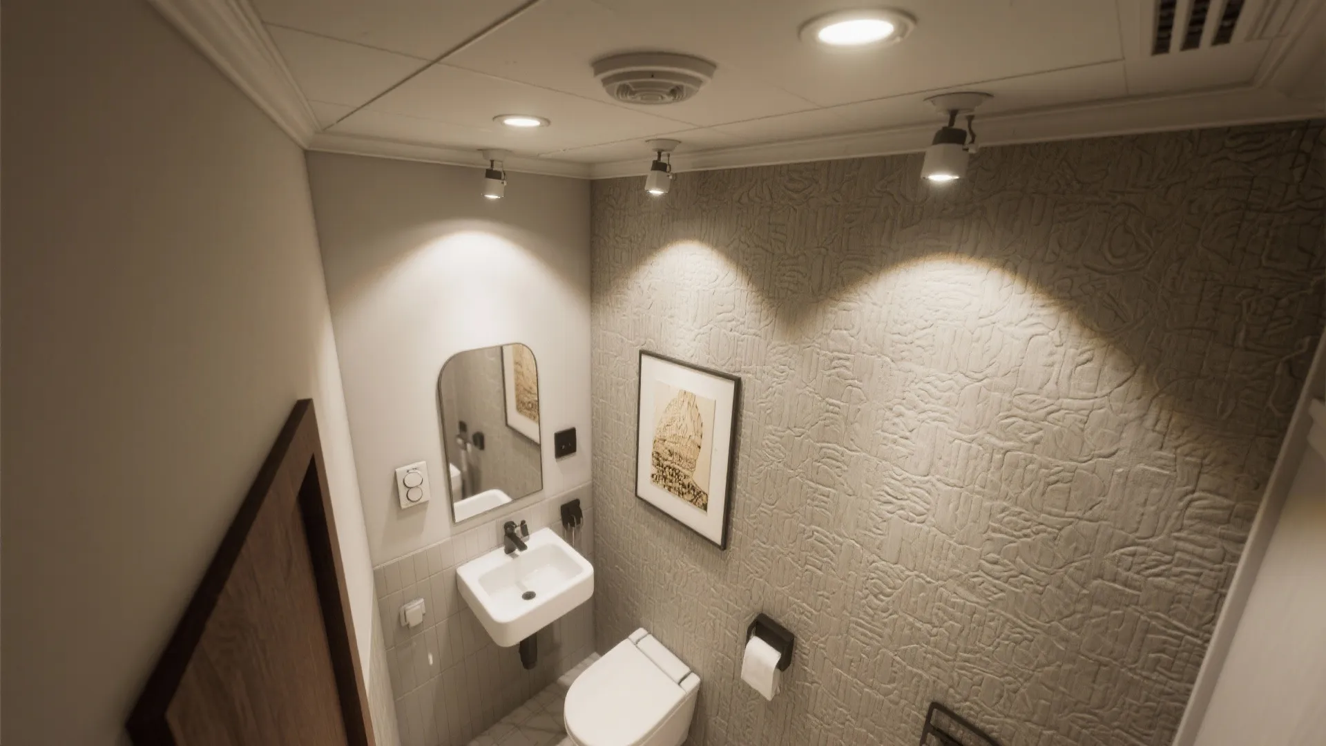 Small modern toilet room with textured wall, white sink, wall picture, and bright ceiling lights