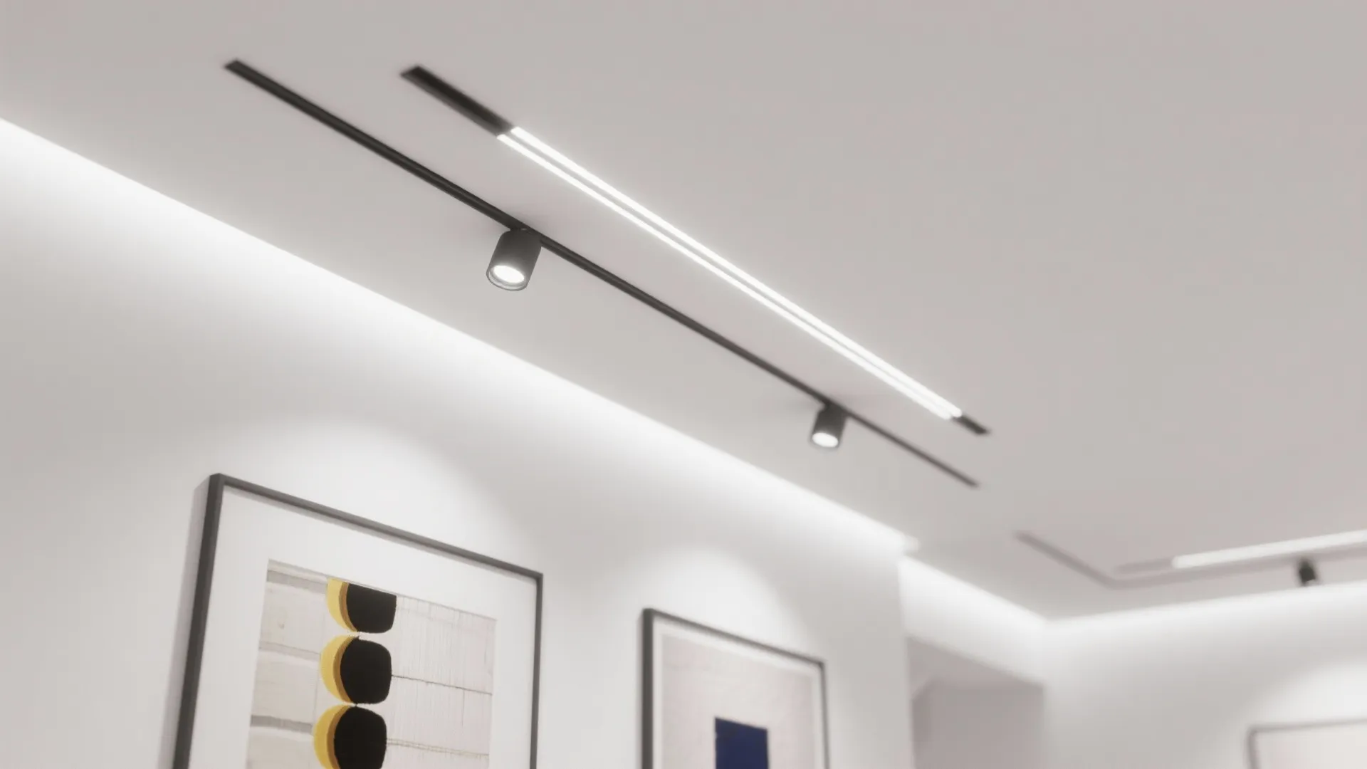 Minimalist recessed spotlights illuminating artwork in tall room