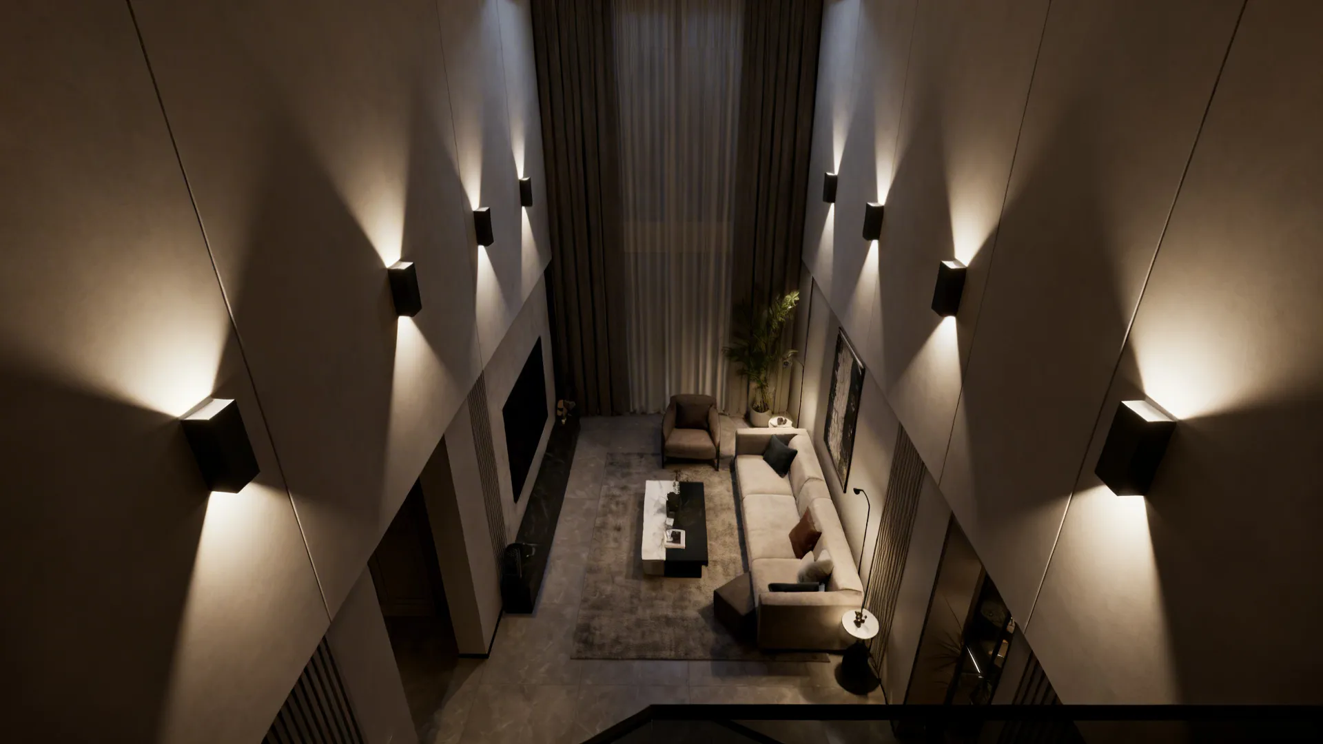 Narrow living room lit by recessed wall-wash sconces that create vertical highlights and a taller feel.