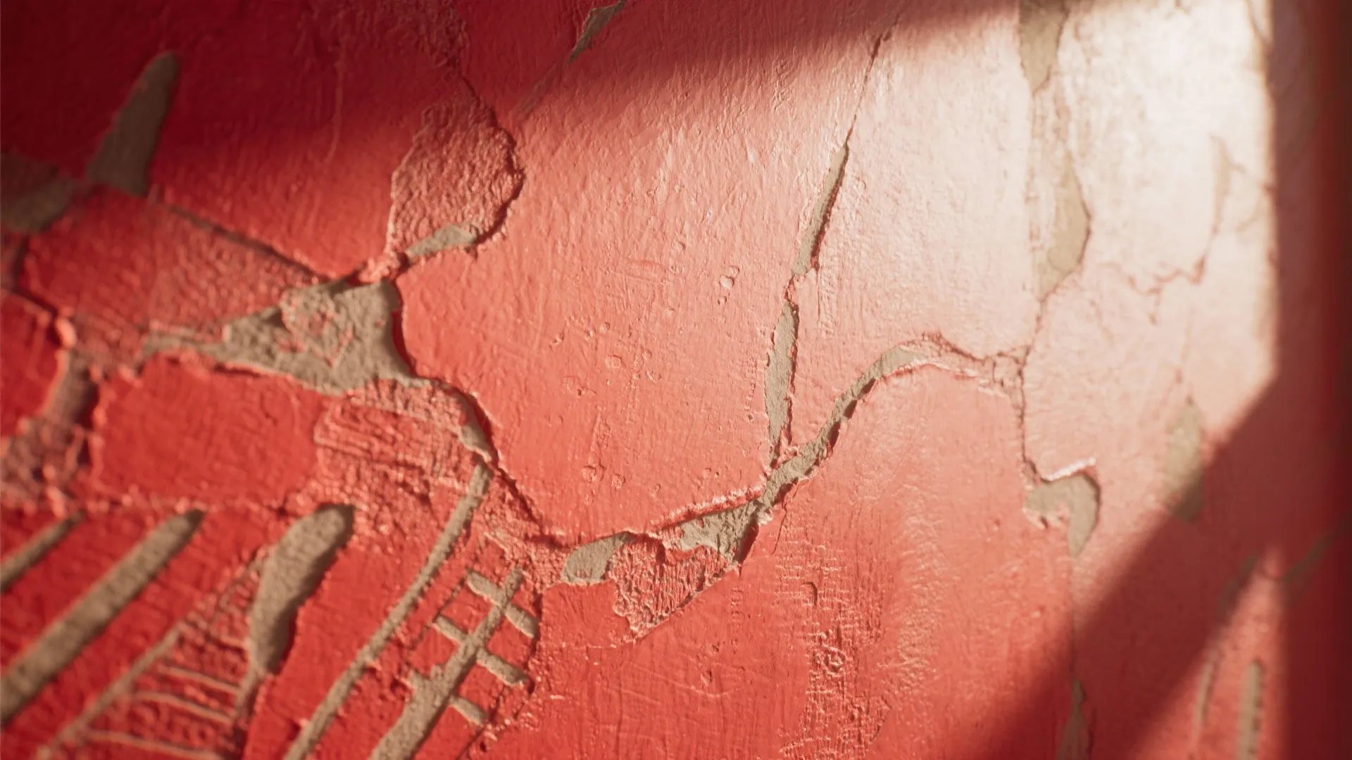Close up view of red cracked wall panel with rough texture and bright natural sunlight