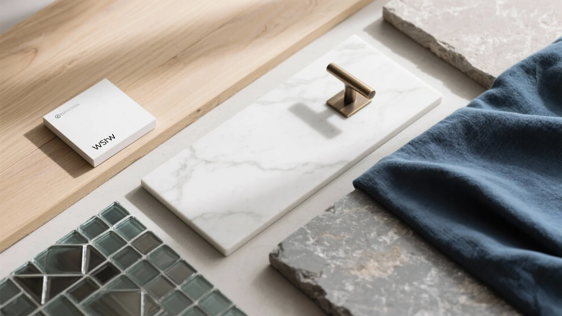 Interior design material board with wood planks marble slab metal handle blue fabric and tiles