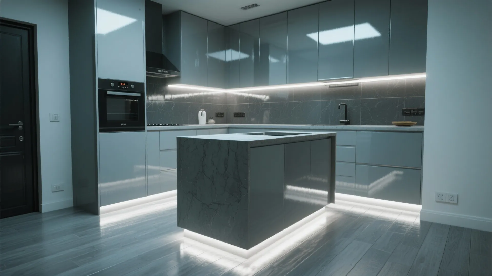 Studio kitchen with glossy uppers and a mirrored backsplash strip reflecting light across grey laminate floors.