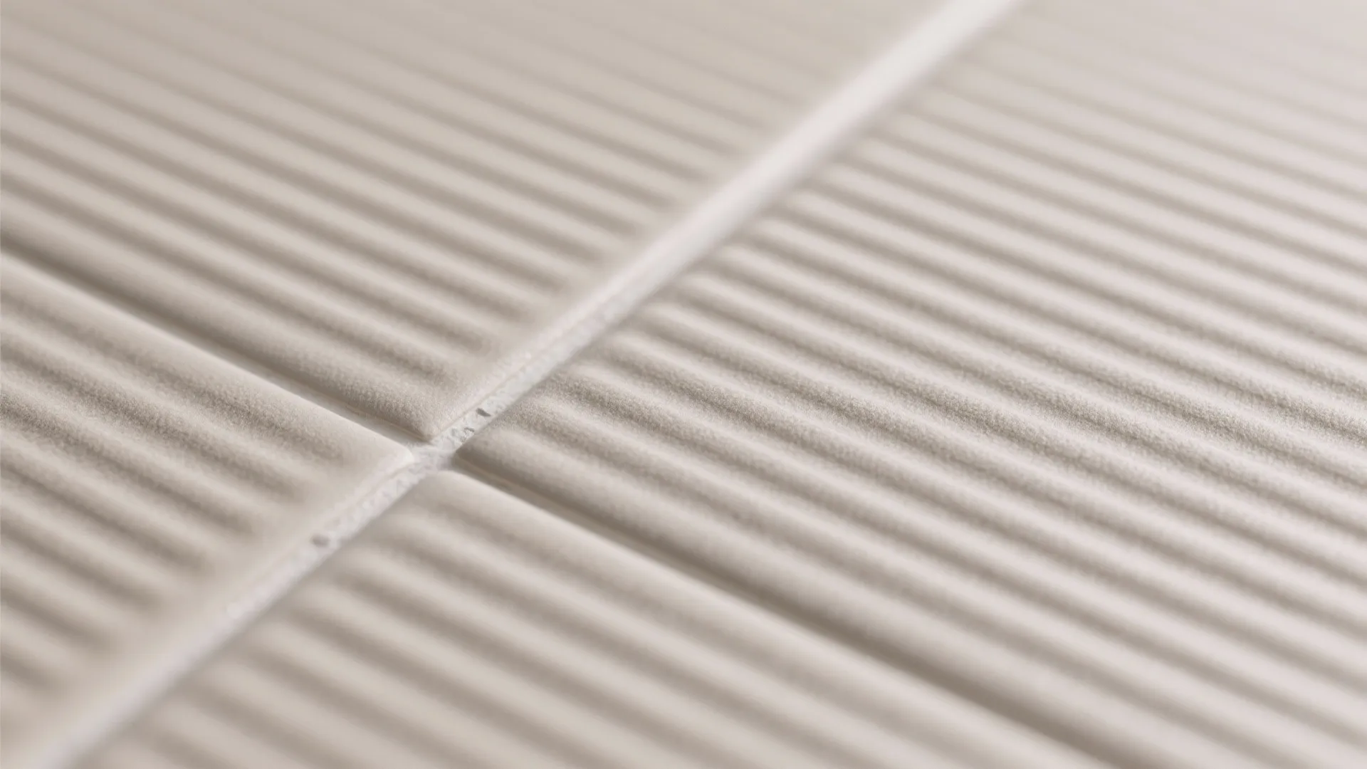 Textured ceramic in soft neutrals for tactile calm