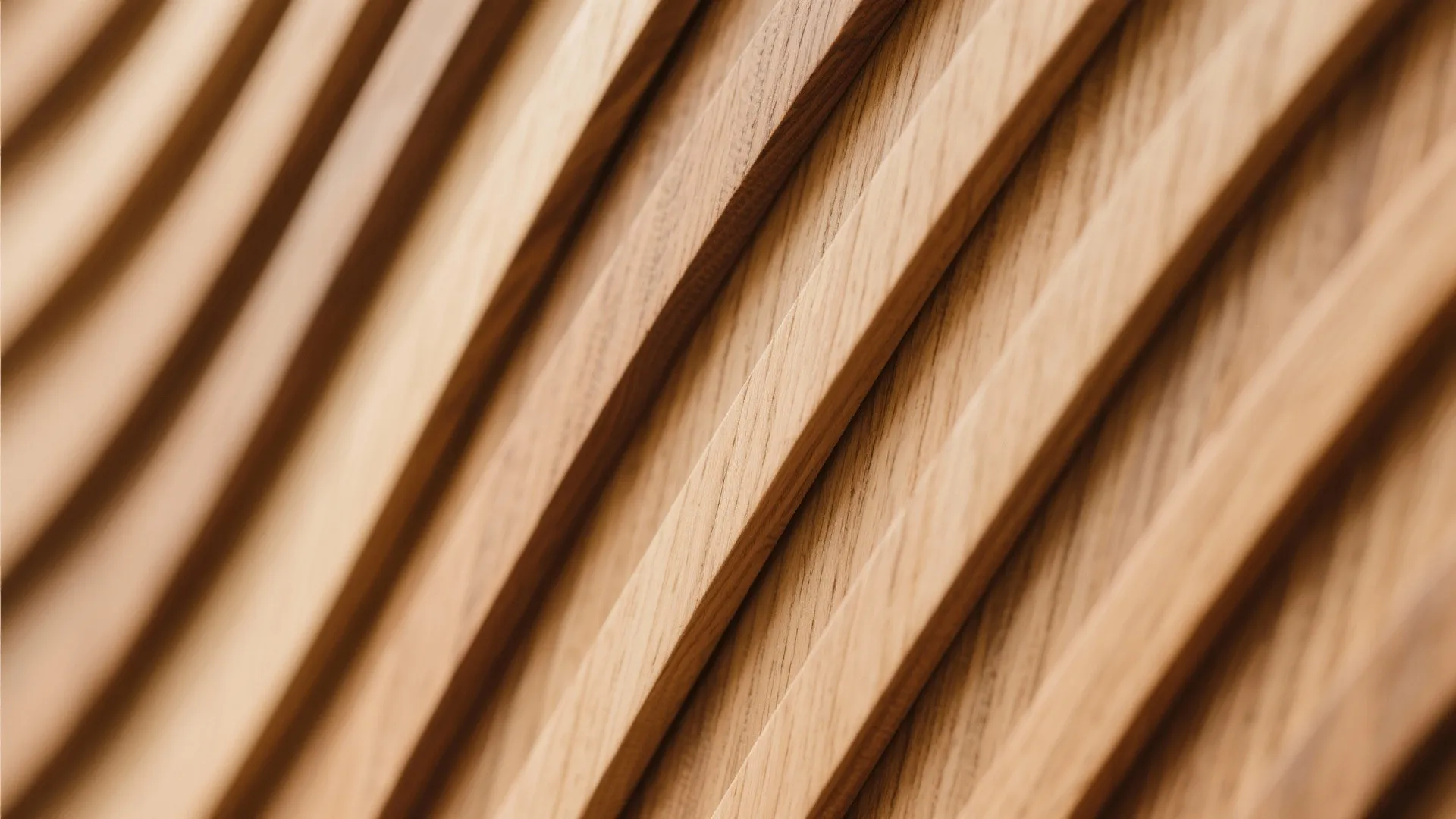 Close up view of diagonal light brown wooden slats used for wall panel decorative texture