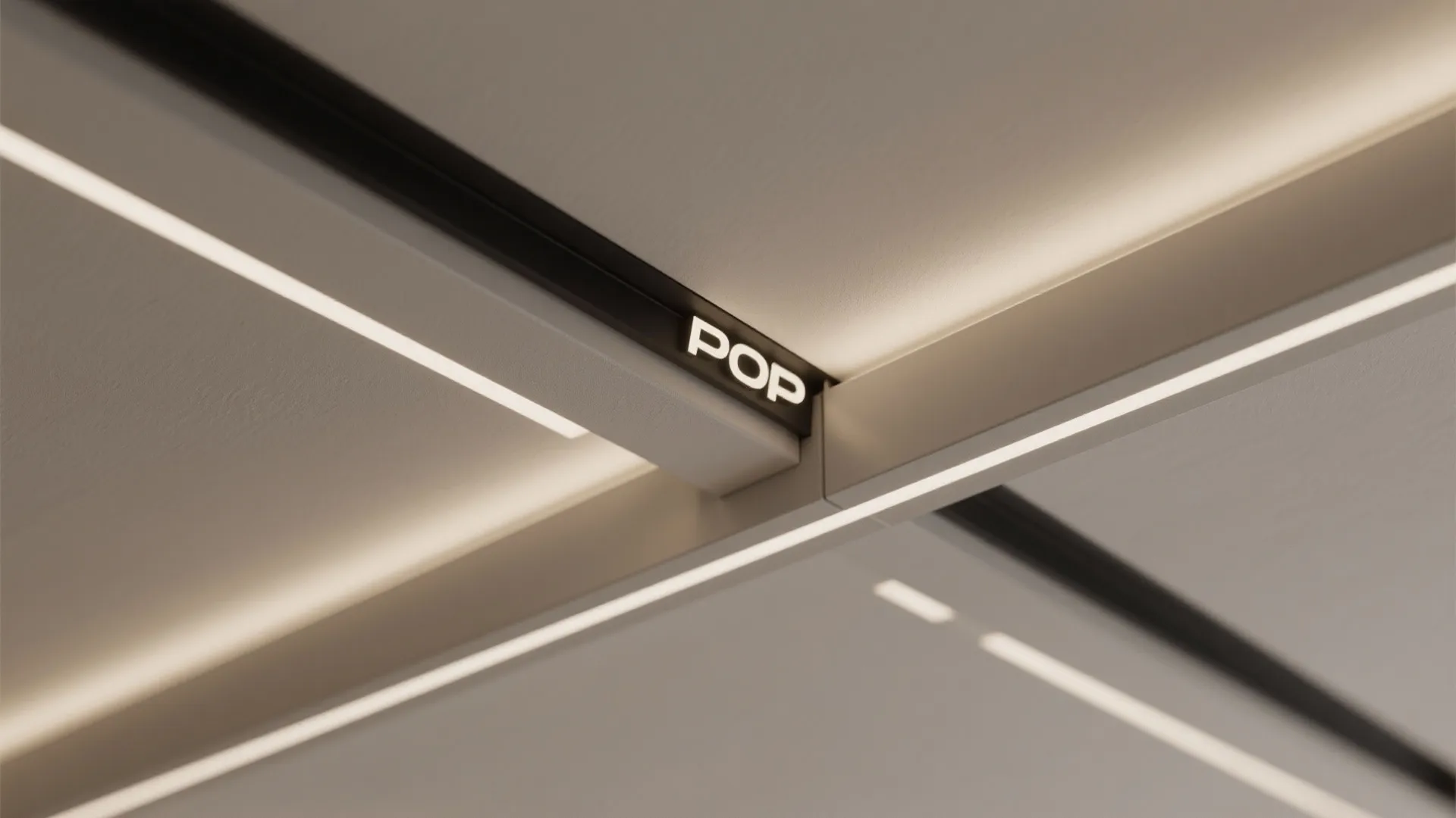 Close up view of a modern ceiling light fixture with integrated linear lights and pop