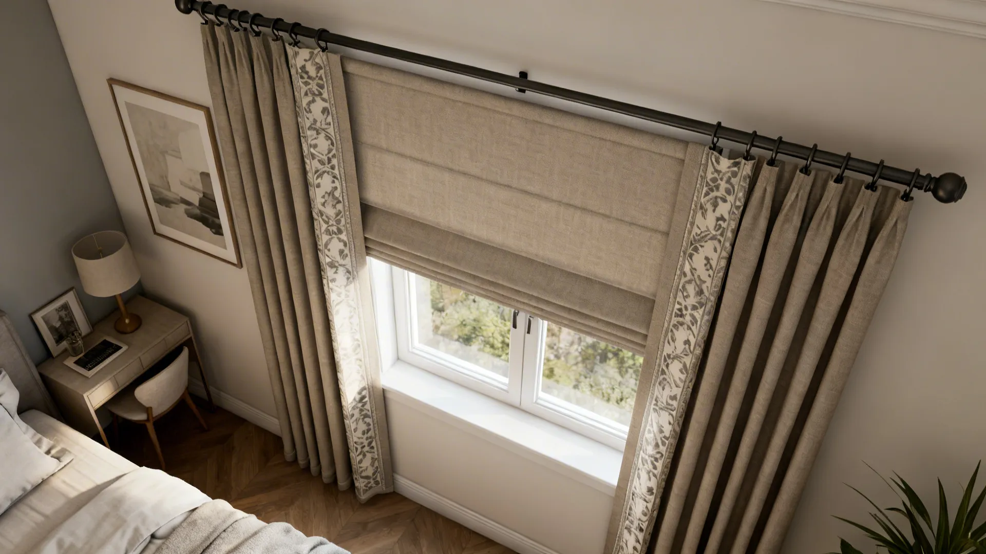 Bedroom window featuring tan curtains with decorative floral borders and matching shades next to desk
