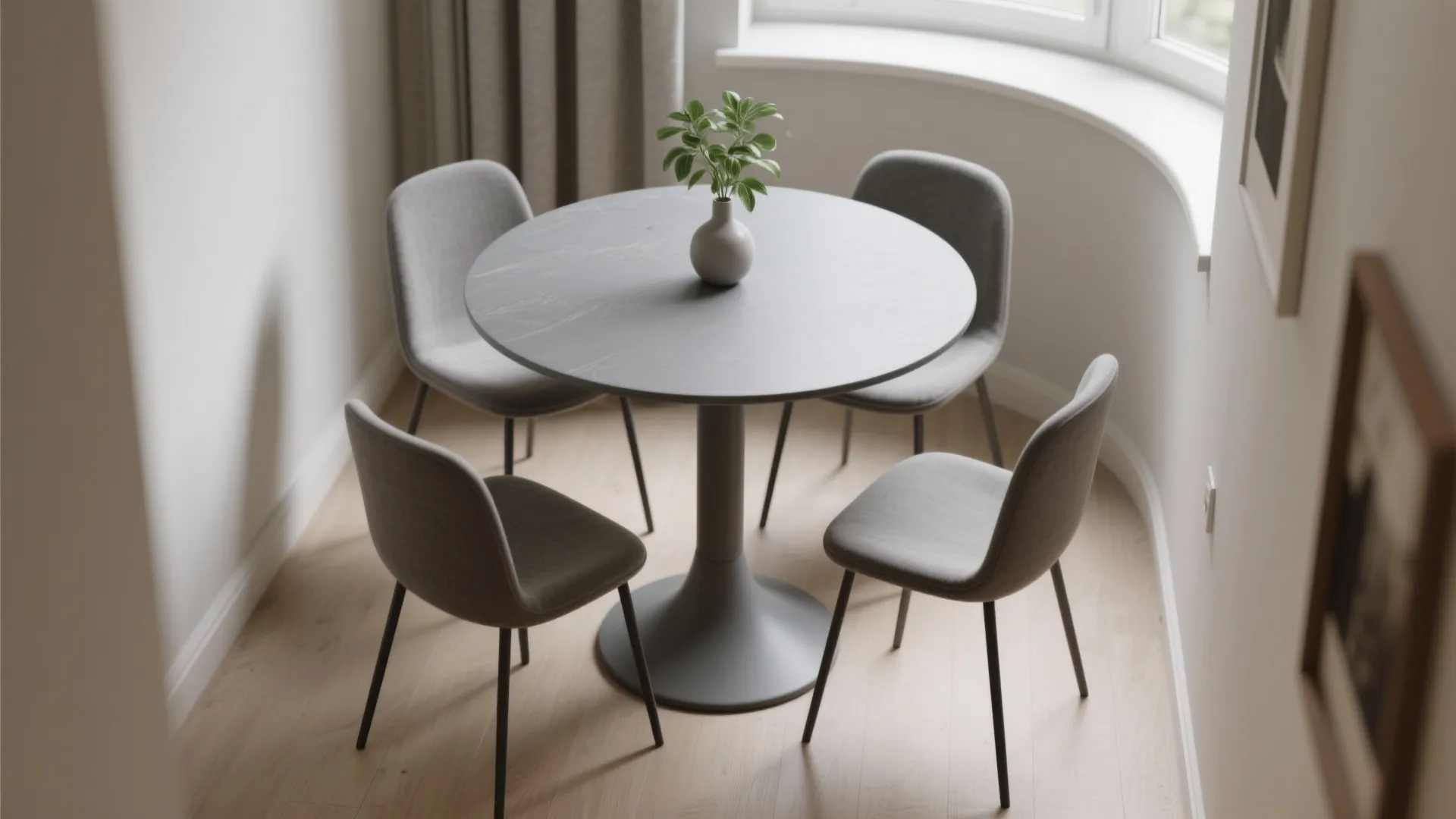 3. Round gray pedestal table to save space