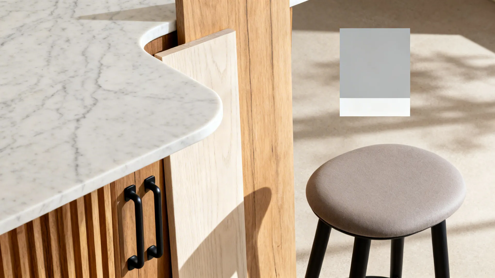 Rounded-edge island to reduce elbow wars