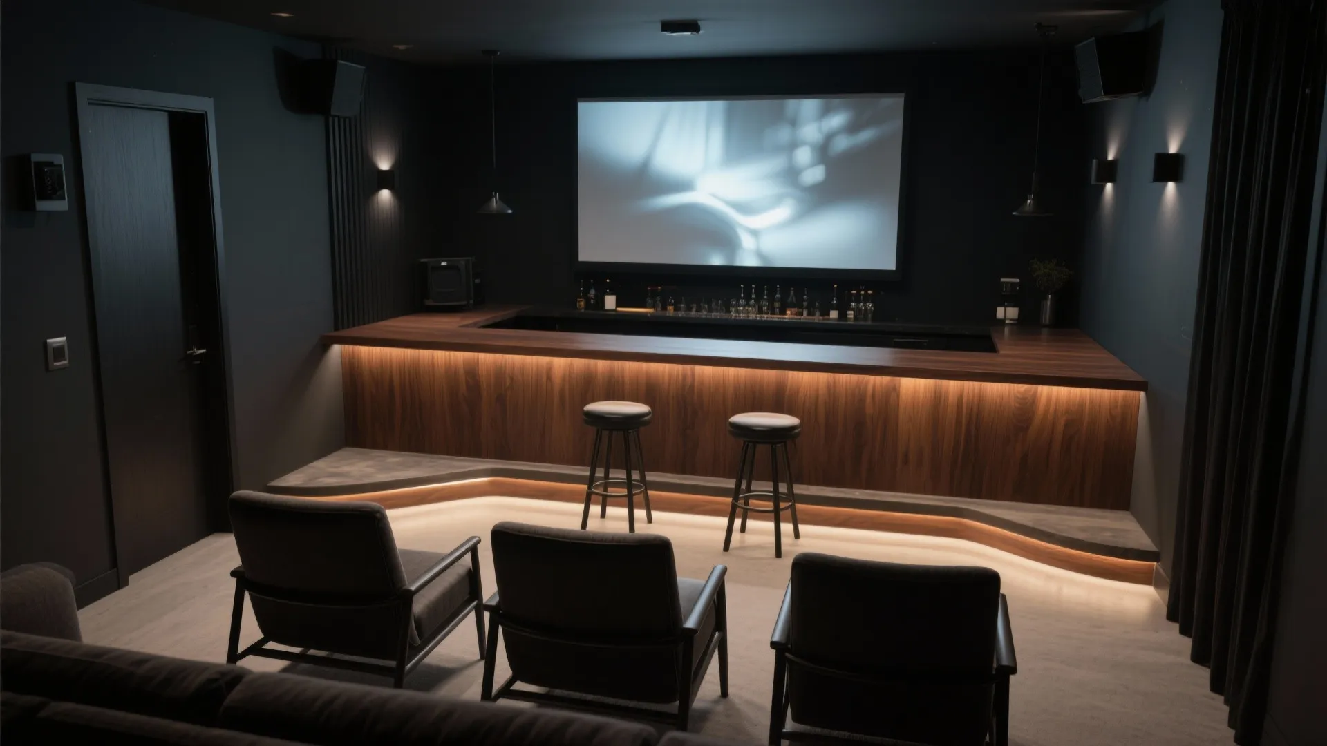 Luxury home cinema featuring wooden bar counter with stools and comfortable lounge chairs facing screen