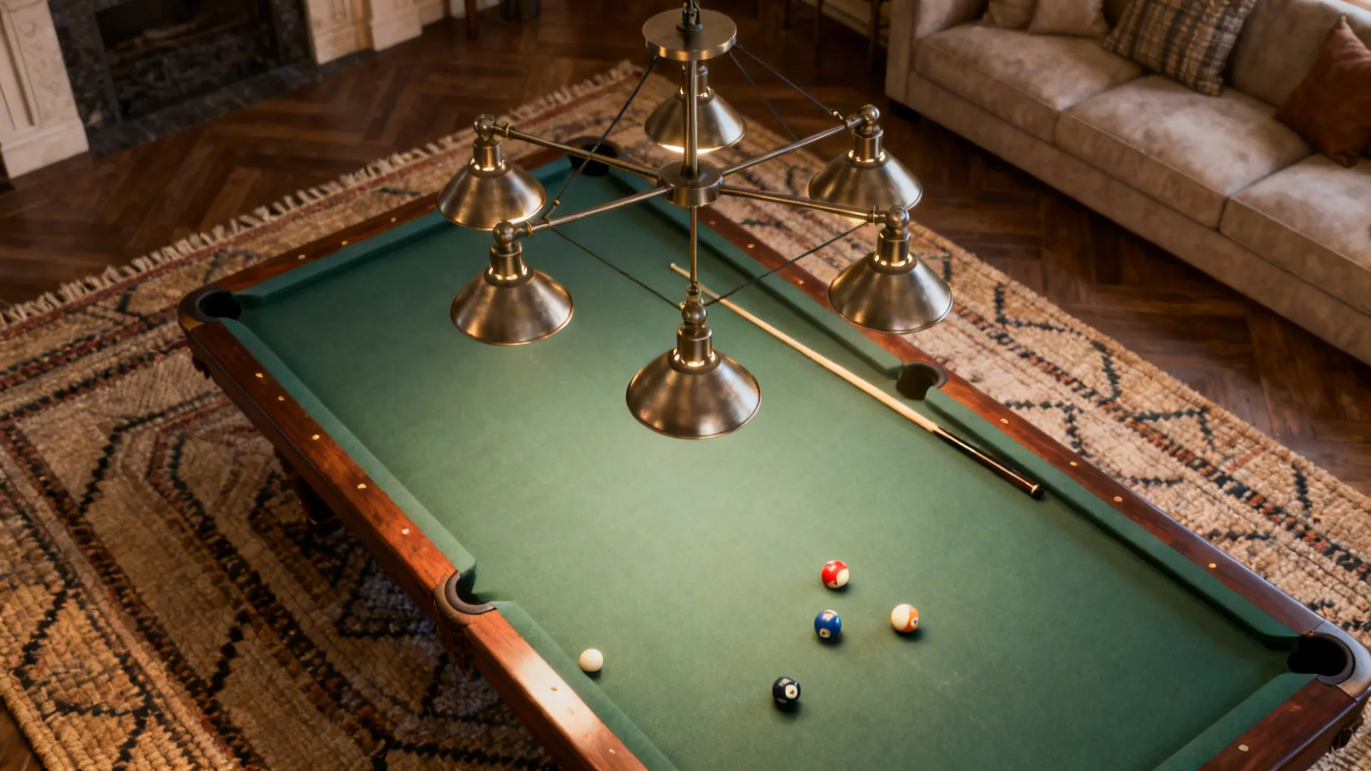 Pool table anchored by a large rug and adjustable pendant lighting to define the game zone.