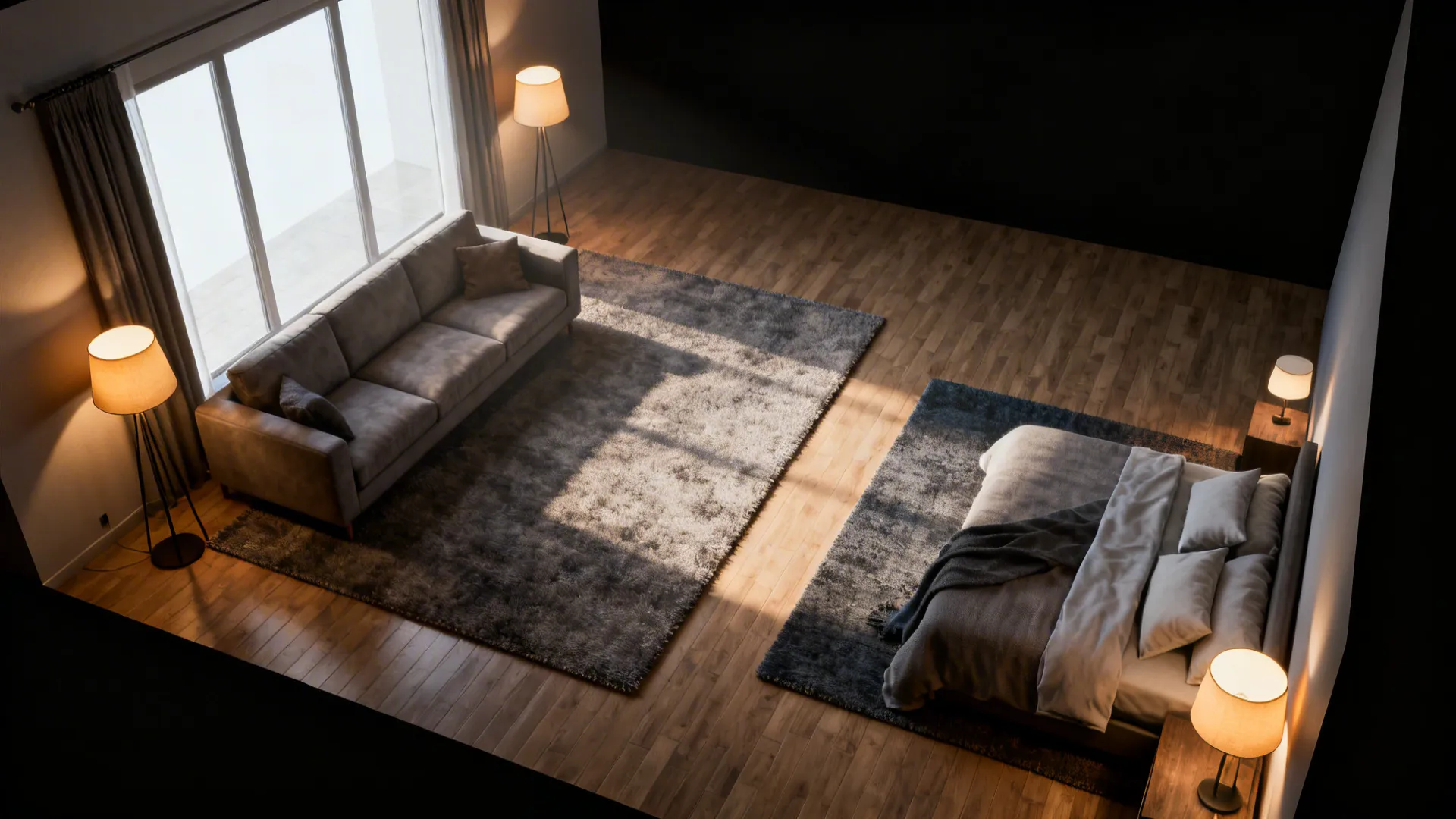 Open plan room with grey sofa and bed on separate rugs under four warm lamps