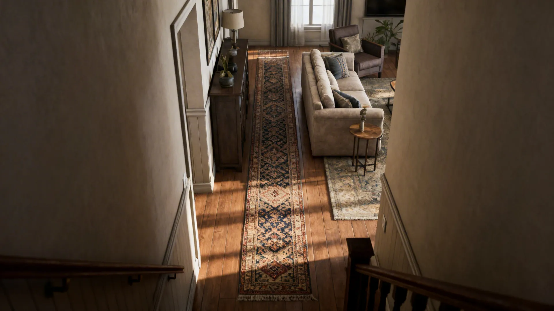 Long patterned runner rug on wood floor beside beige sofa and dark wooden storage cabinet