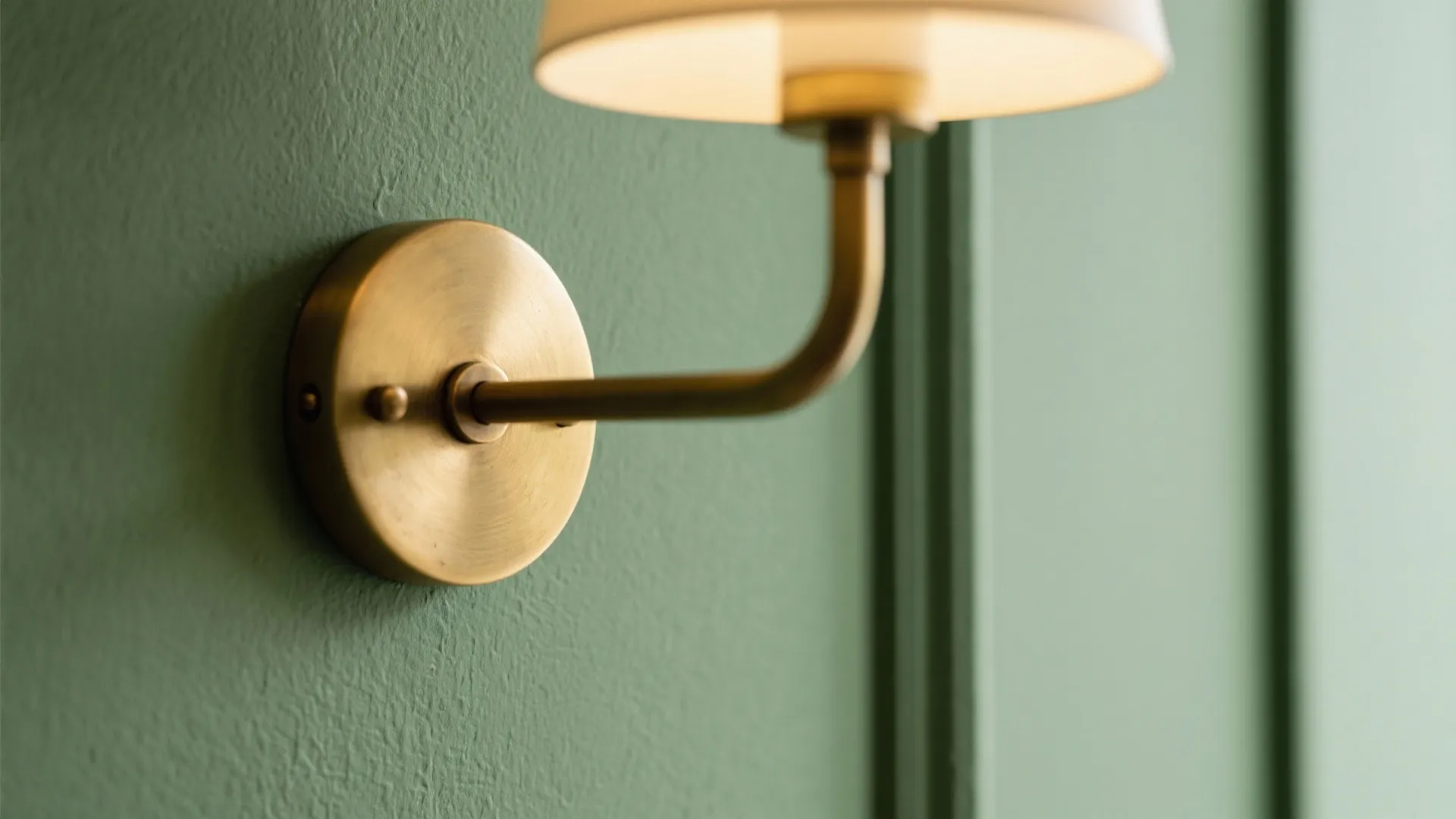 5. Sage Green and Brass Accents