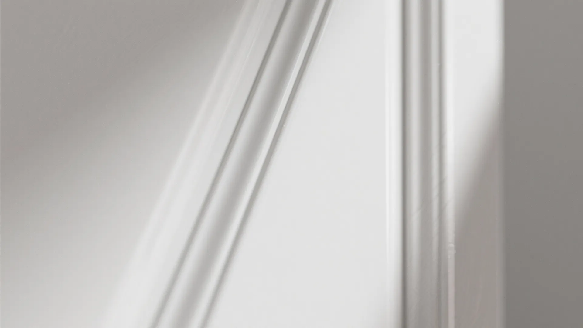 Close-up of mid-range satin enamel finish on a cabinet door showing smooth, durable surface