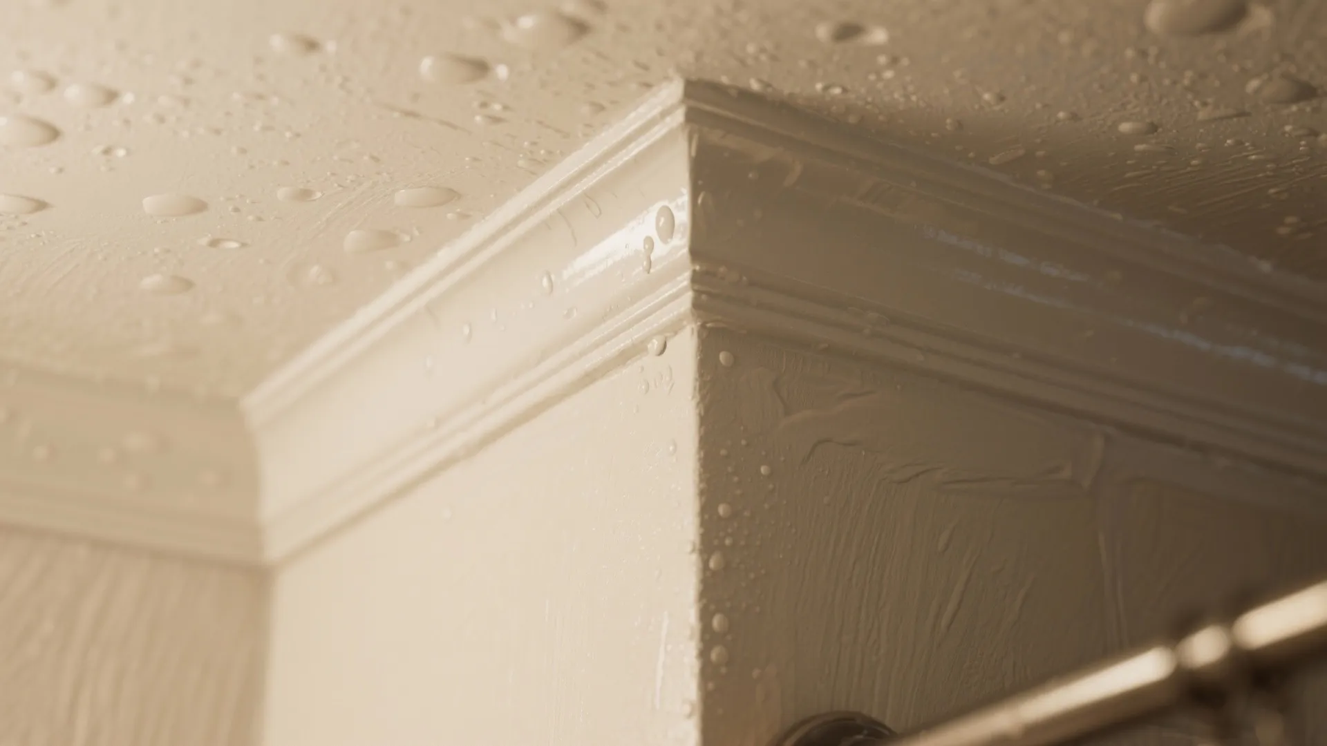 Close up view of white ceiling wall panel with water drops showing moisture resistant paint finish