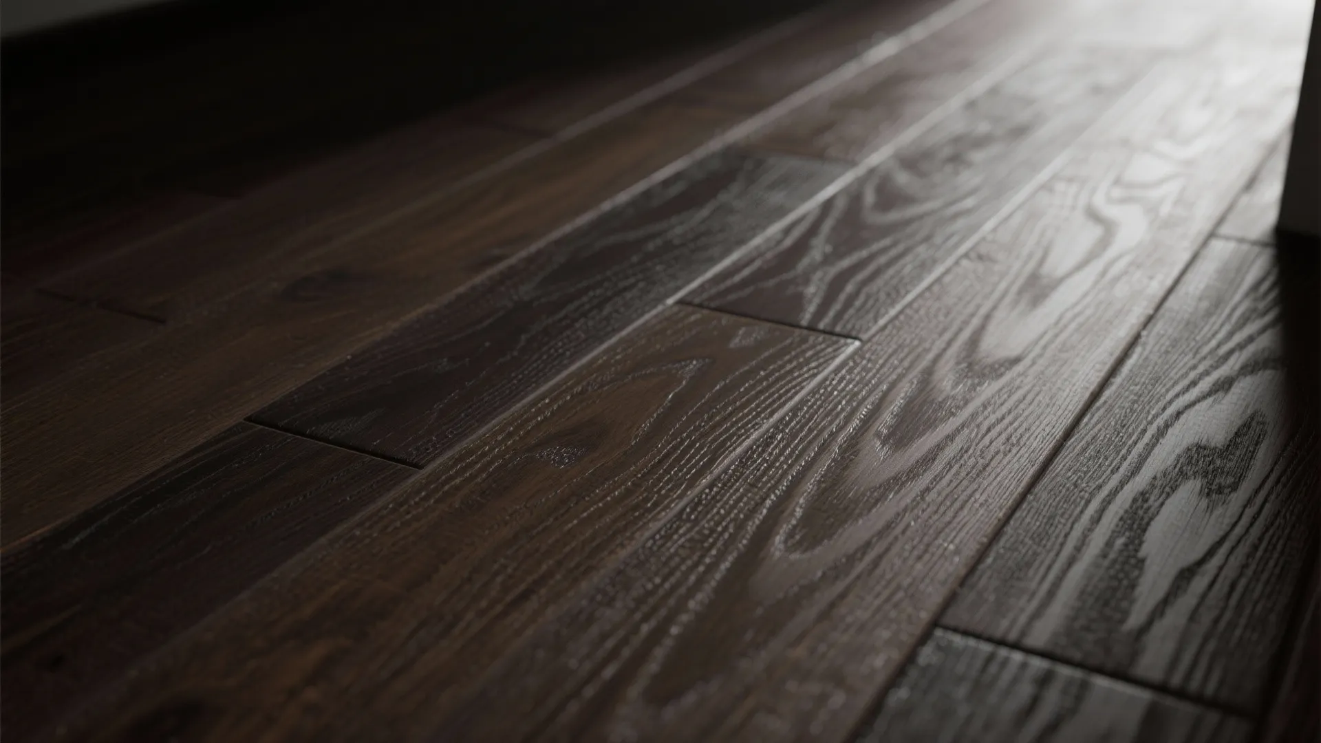 Macro of satin dark wood with subtle wire-brushed texture and minimal glare.