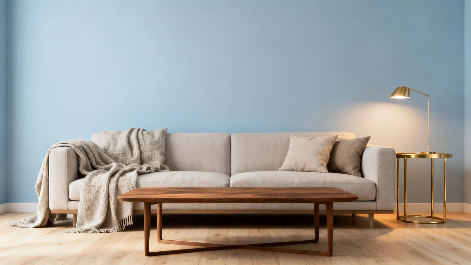 Scandi minimalist living area with light blue walls, walnut coffee table and brass accents
