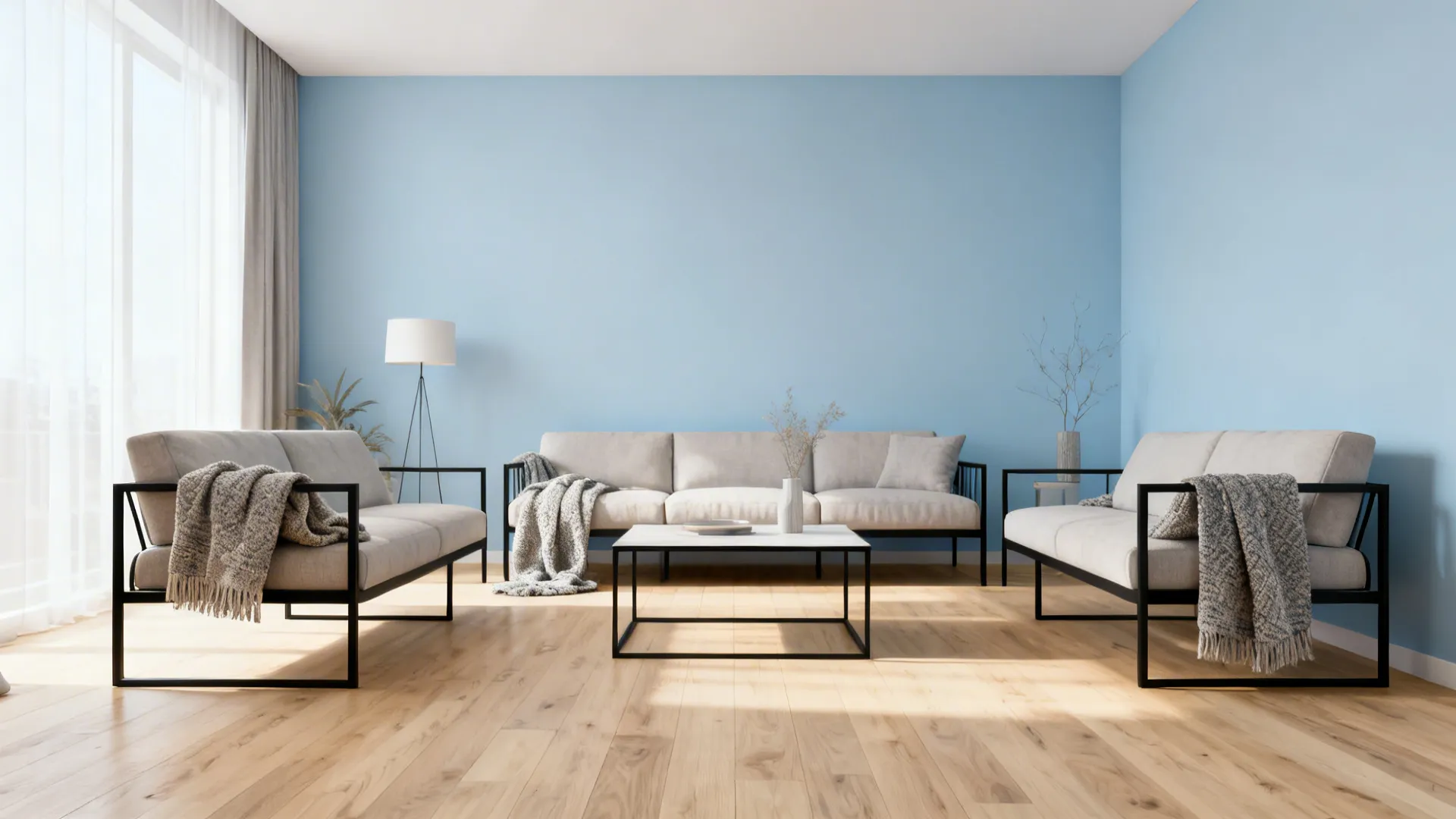 Scandinavian style living room with pale blue walls, pale oak floors and black metal accents.