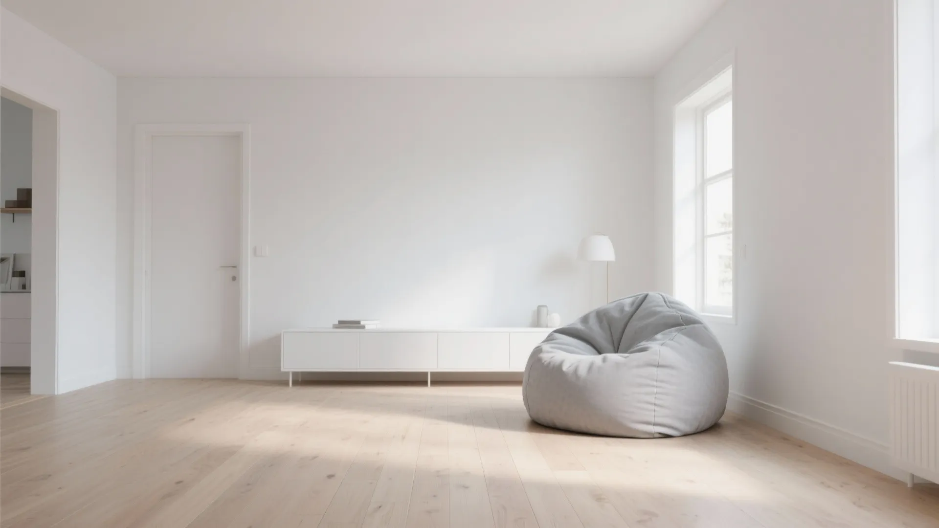 Scandinavian living room with white walls and a grey bean bag