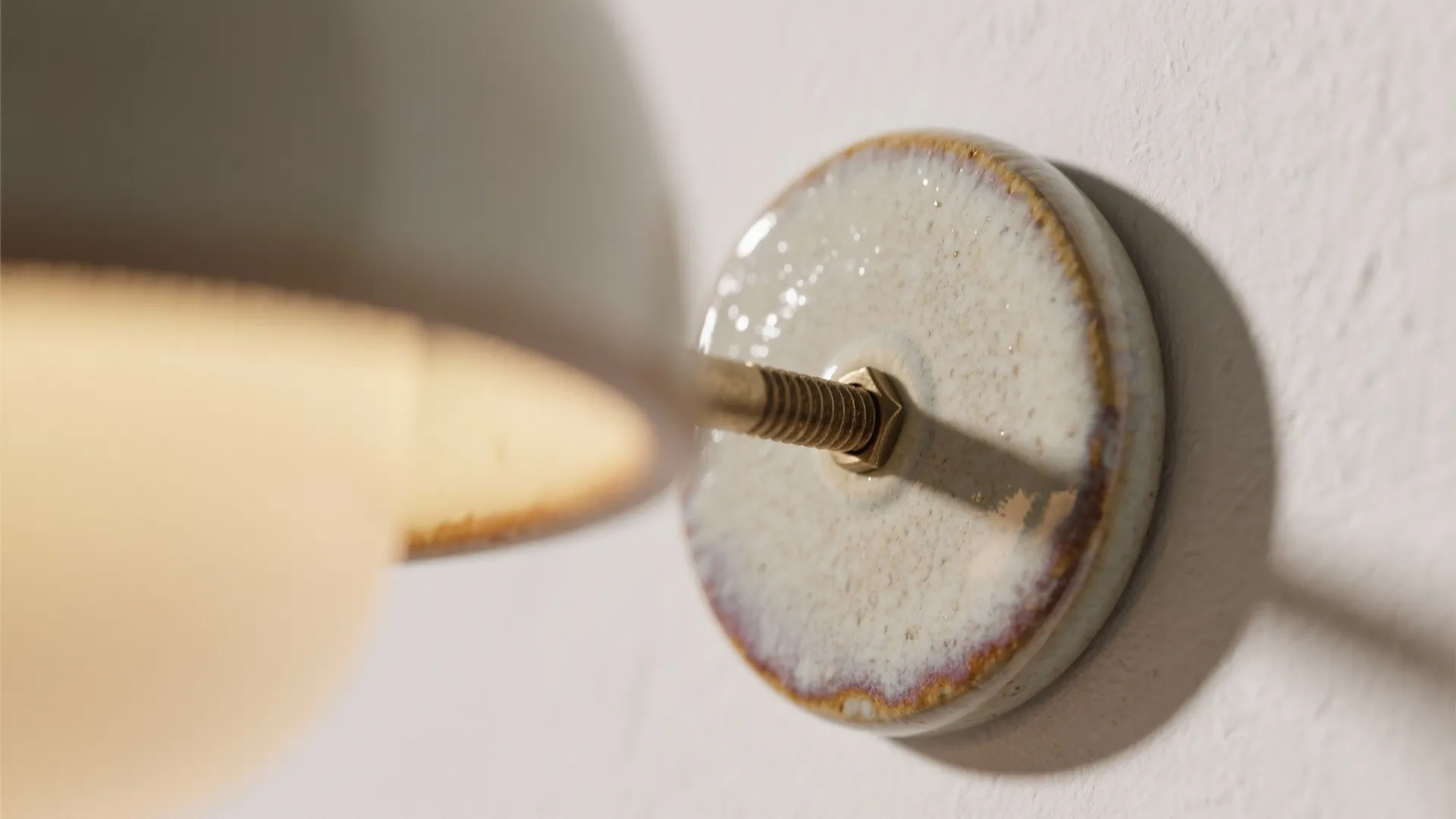 1. Ceramic sconce as a sculptural focal point