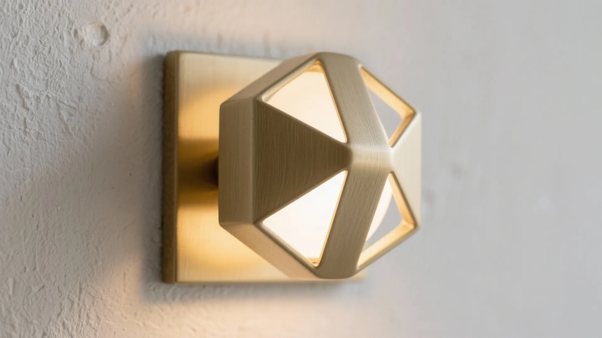 Geometric sconces as sculptural accents