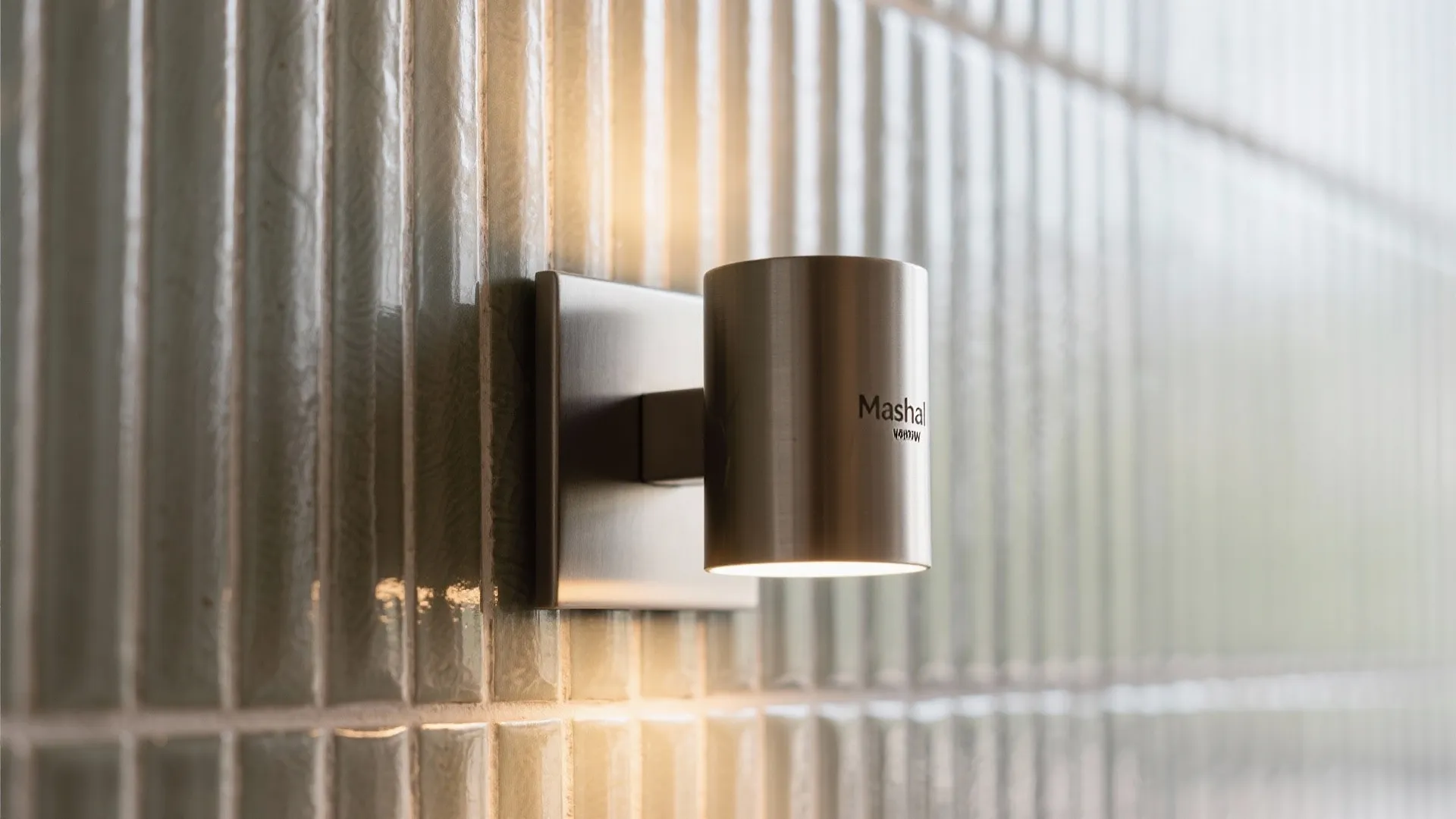 Minimalist Mashal Wall Sconces Along the Backsplash