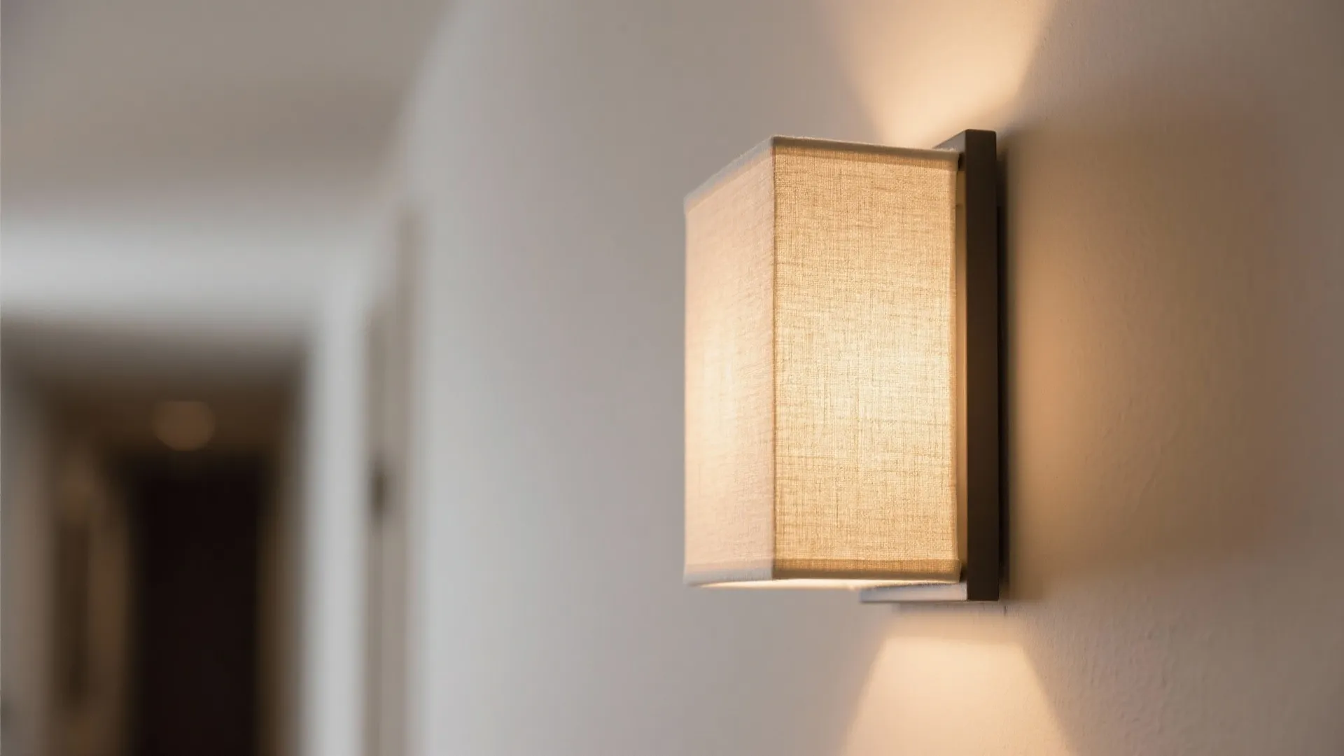 Layered Lighting: Sconces, Coves, and a Quiet Statement