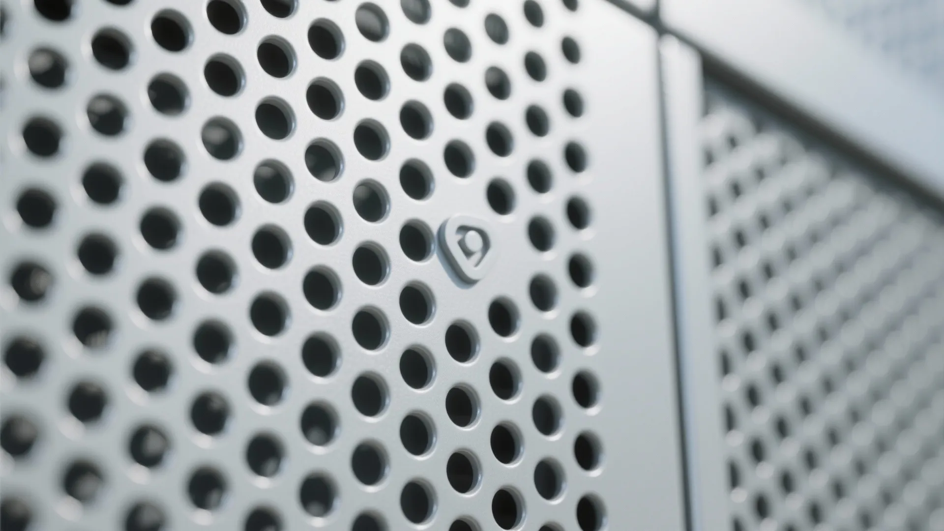 Perforated parapet screens that breathe