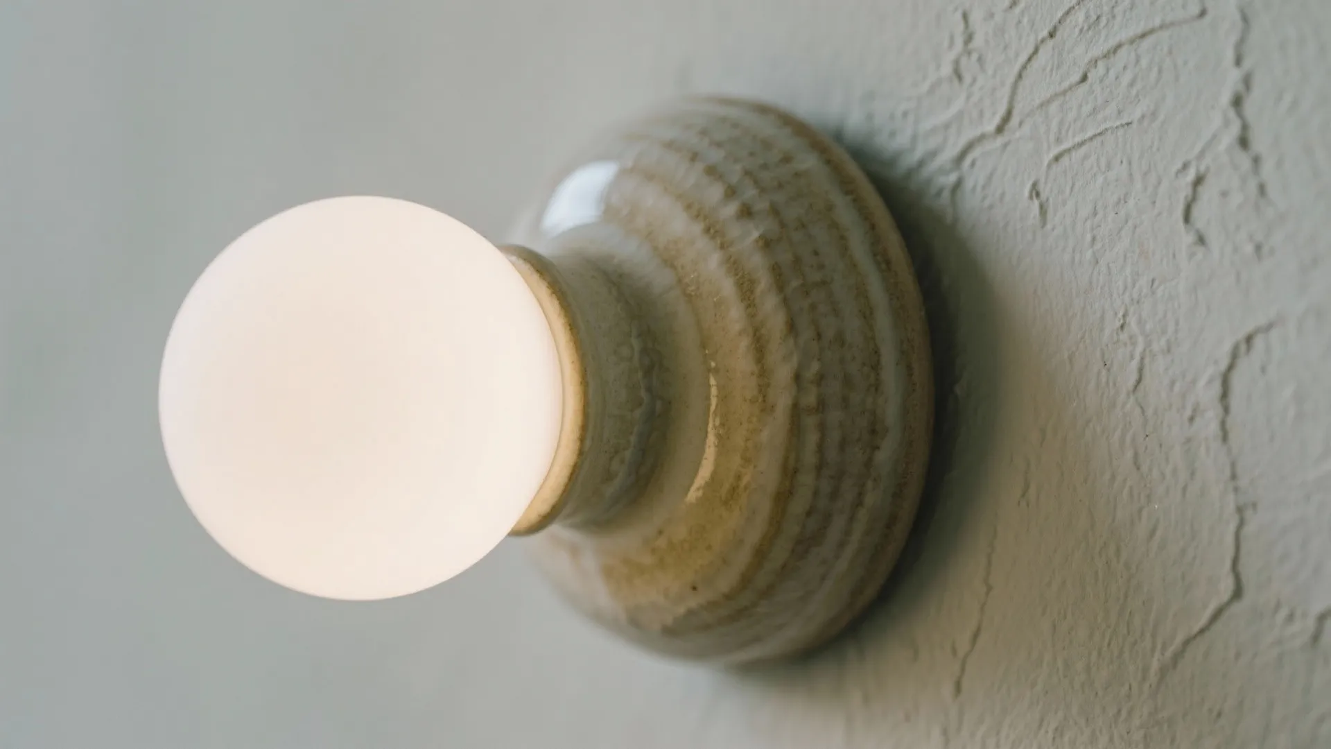 5) Sculptural statement sconces as focal points