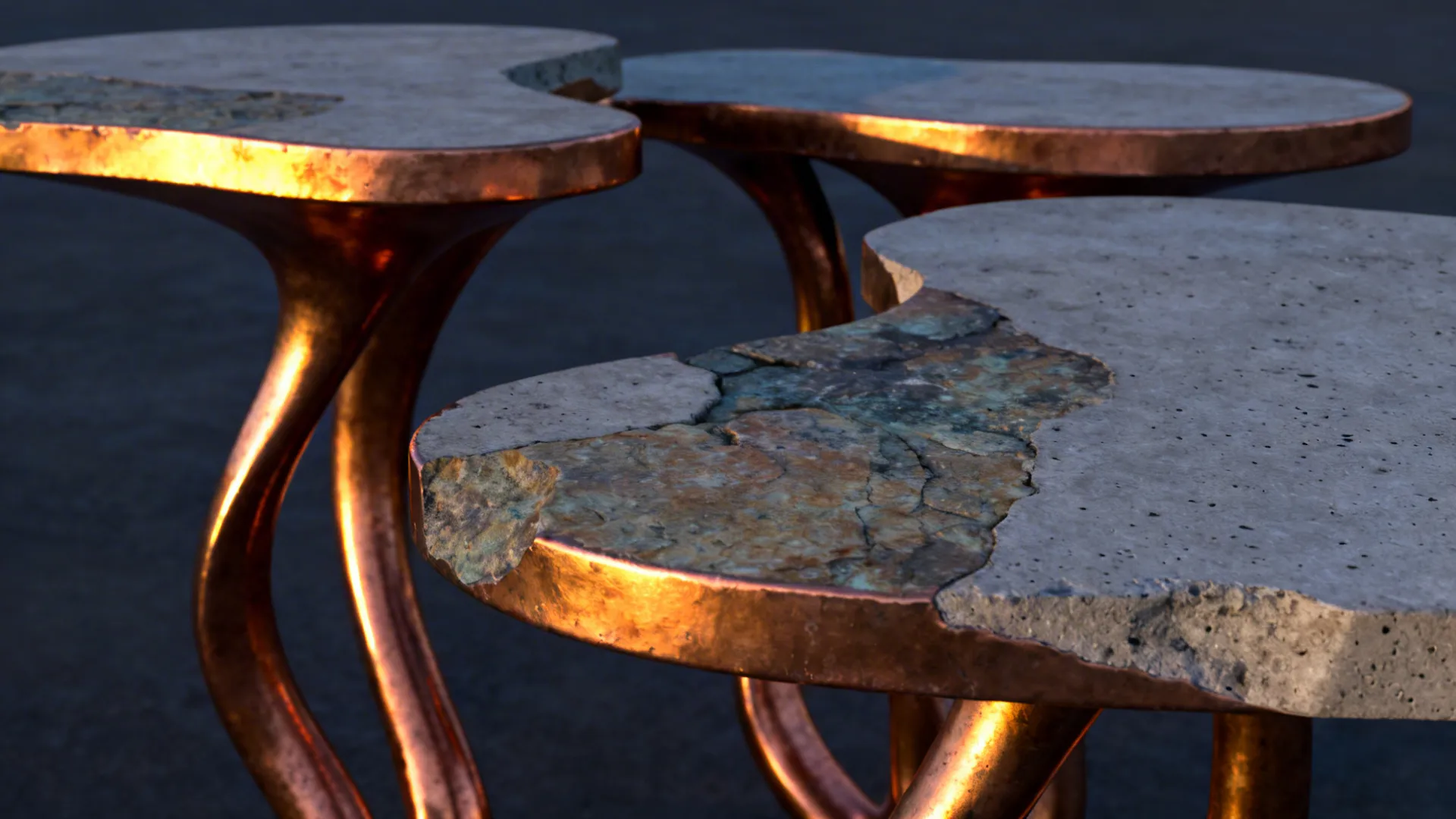 Copper-and-concrete sculptural table trio with reflective evening light emphasizing textures