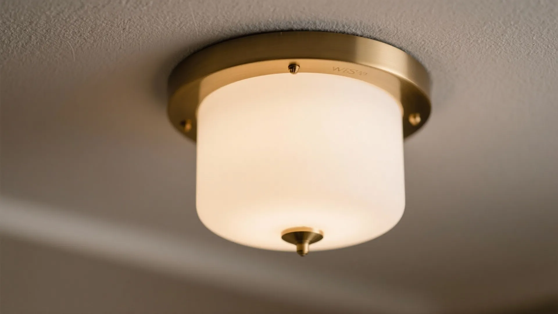 Shallow semi-flush with diffused glass (a ceiling hugger that still has presence)