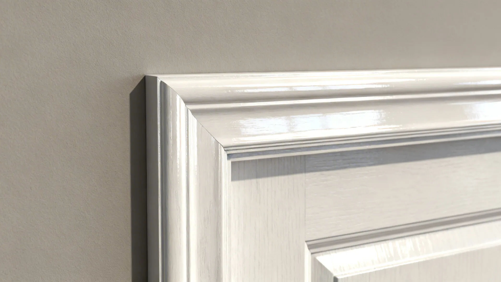 Close-up of semi-gloss trim beside a matte wall showing polished reflection and crisp finish.
