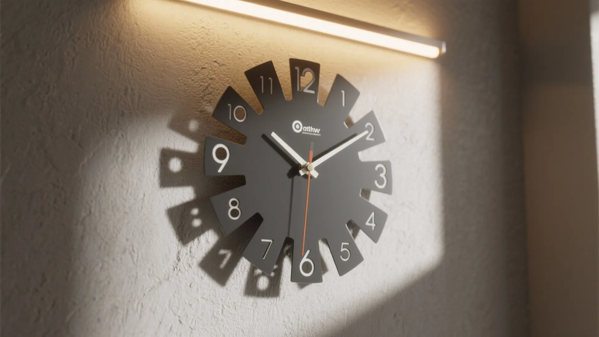 Black sunburst wall clock with white numbers hanging on textured wall under a wall light
