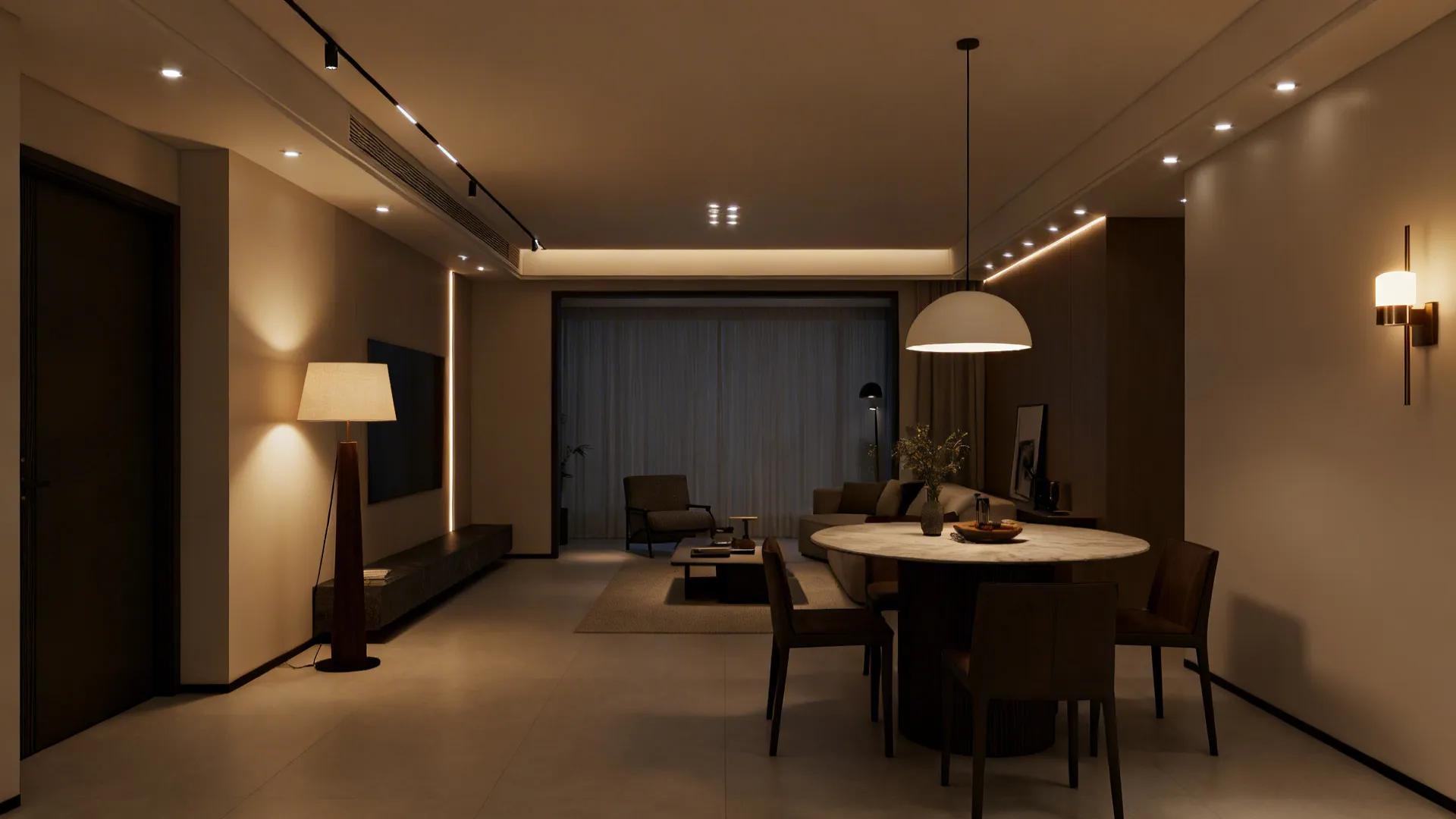 Pendant over dining table and layered living lights tying the L-shaped space together.