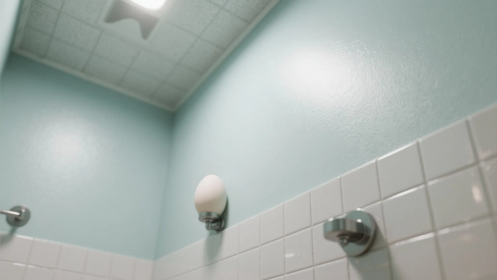 Close-up showing satin wall and eggshell ceiling finishes in the same color with light reflections.