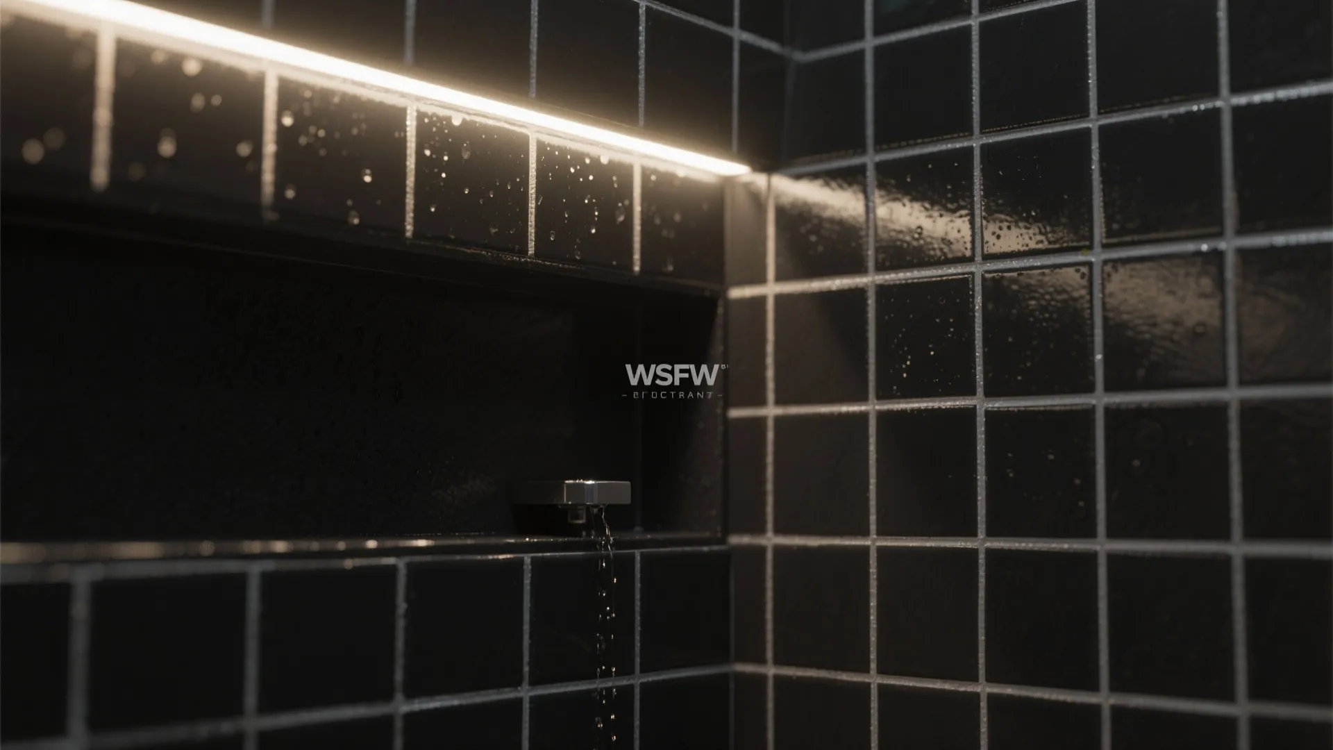 Close up view of black square wall tiles with water drops and a bright light