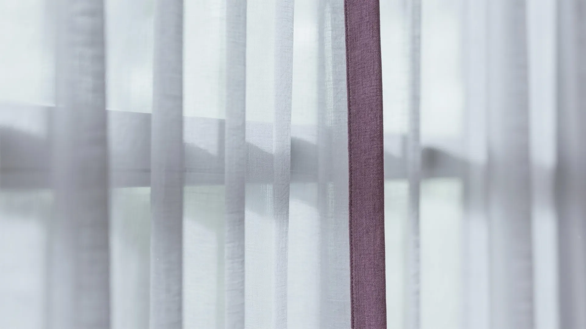 5. Sheer Grey Curtains with Purple Edge Trim