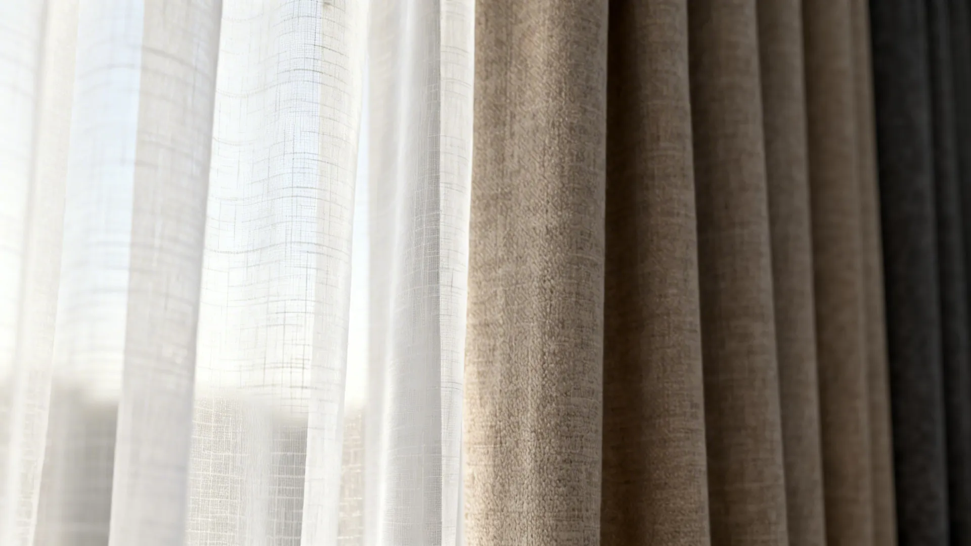 Close-up of sheer and blackout curtain layers showing fabric texture and light filtering