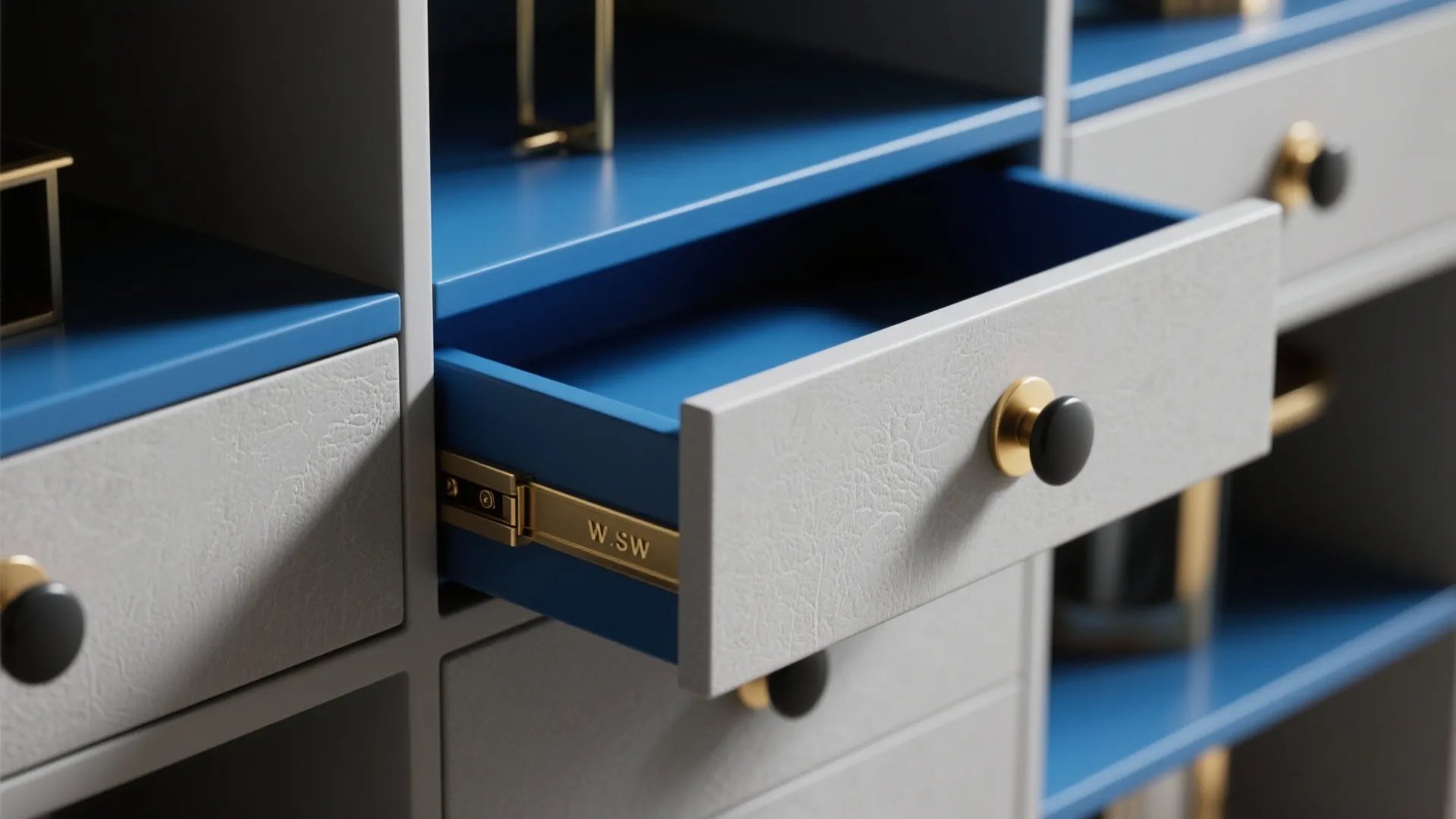 Close-up of blue-accented open shelves, grey cabinet and brass hardware